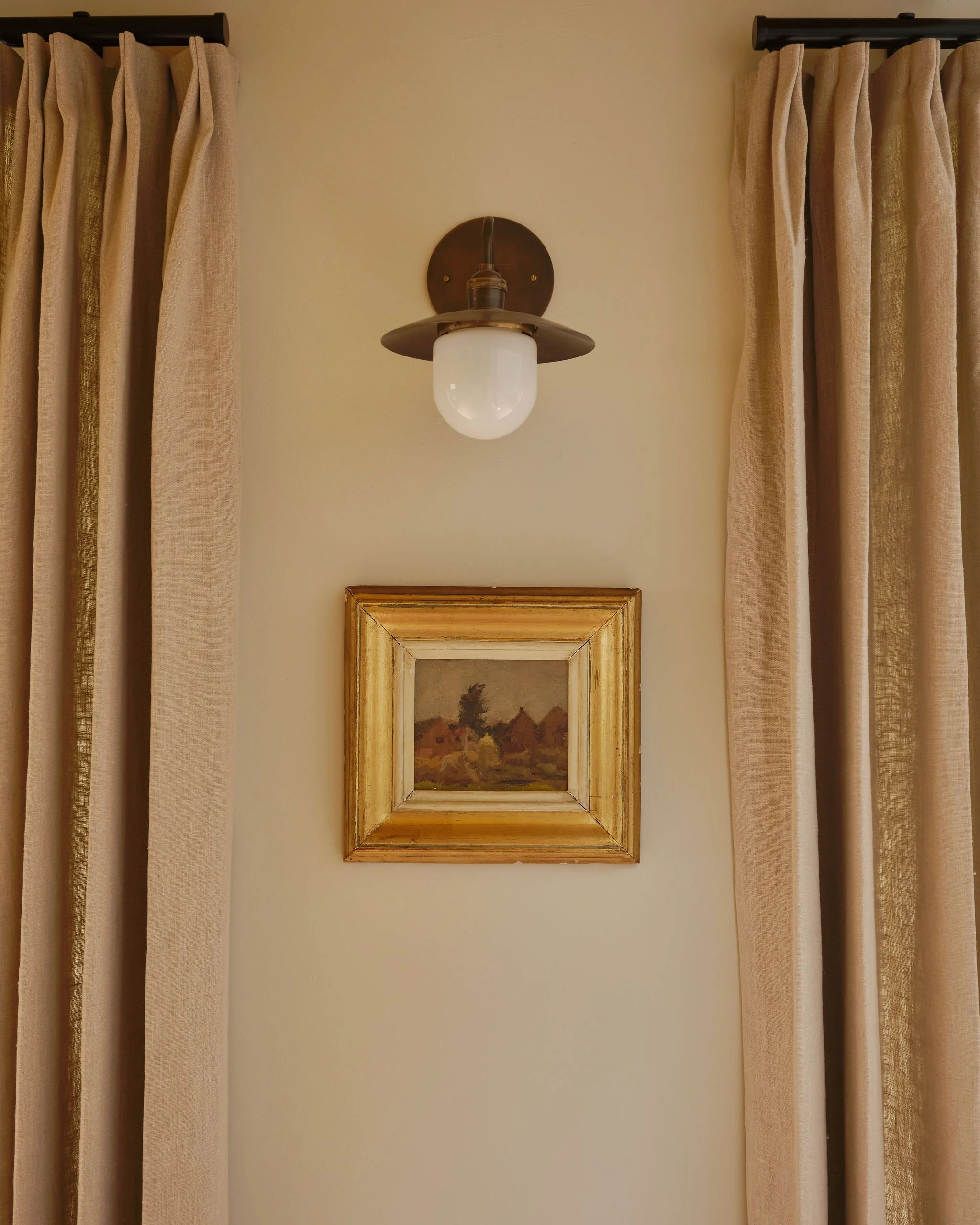 Stylish interior shot from a Thirty Stories project, illustrating seamless flow between spaces and bespoke design elements and antique pieces. Carefully curated interiors in Cornwall and across the South of England.