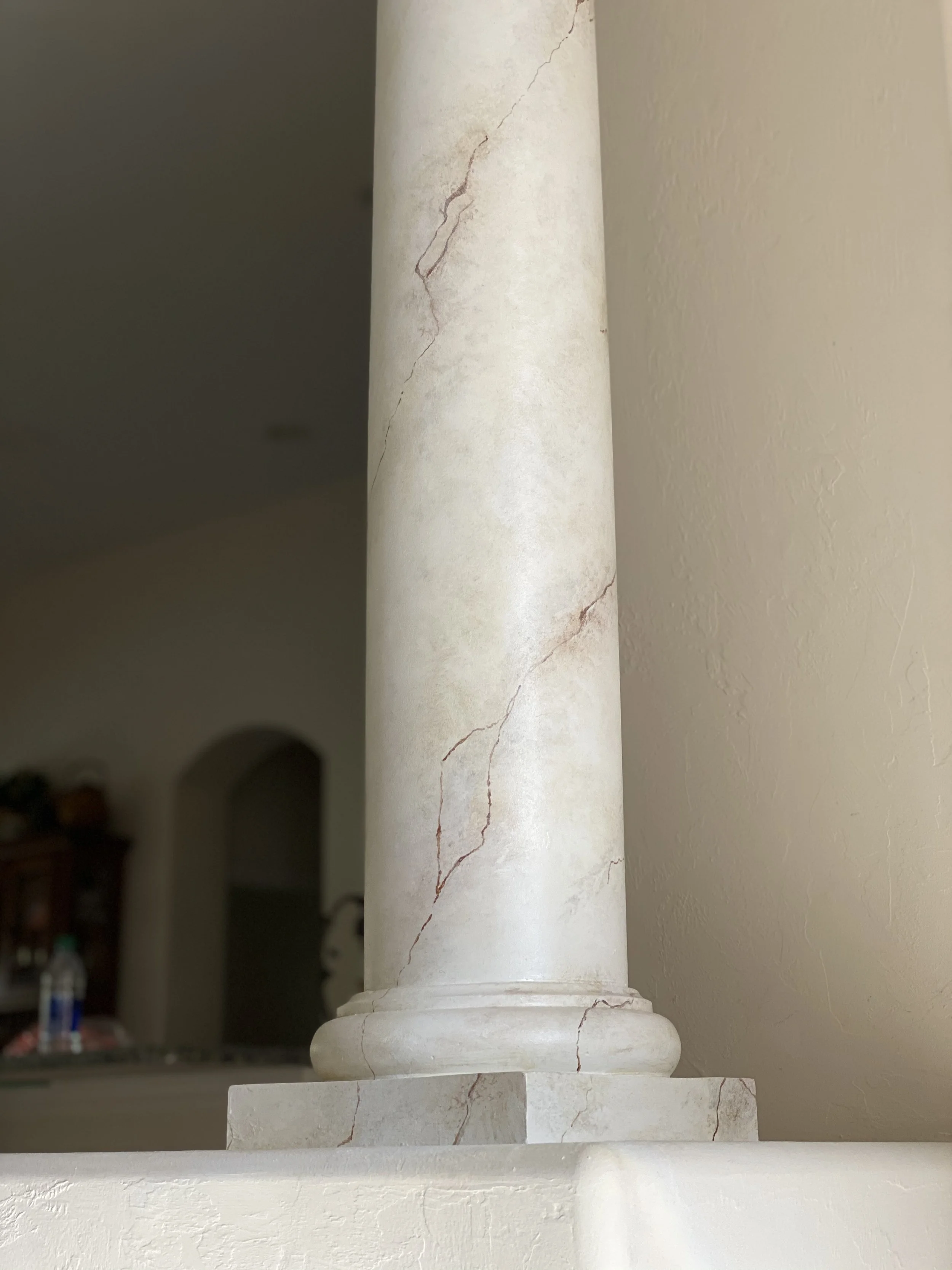 Turn any regular part of your home into a work of art with FAUX FINISH. These columns were transformed from regular white wood pillars to faux marble pillars with paint.