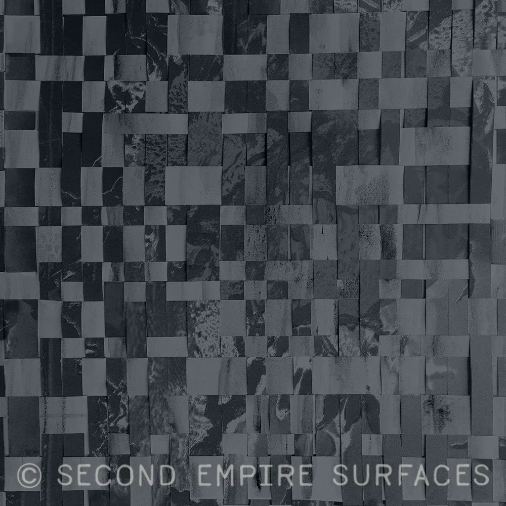 A pattern swatch featuring a deep blue woven motif.