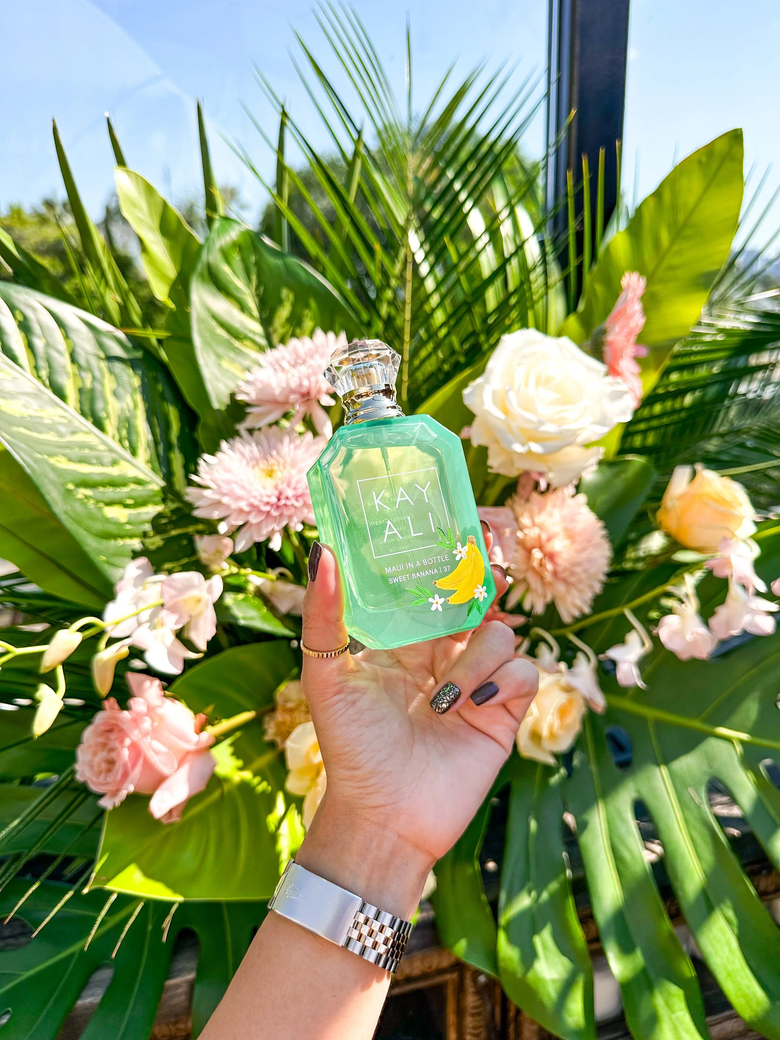 Personalized hand painted Kayali fragrances for Los Angeles brand activation event ink and innuendos