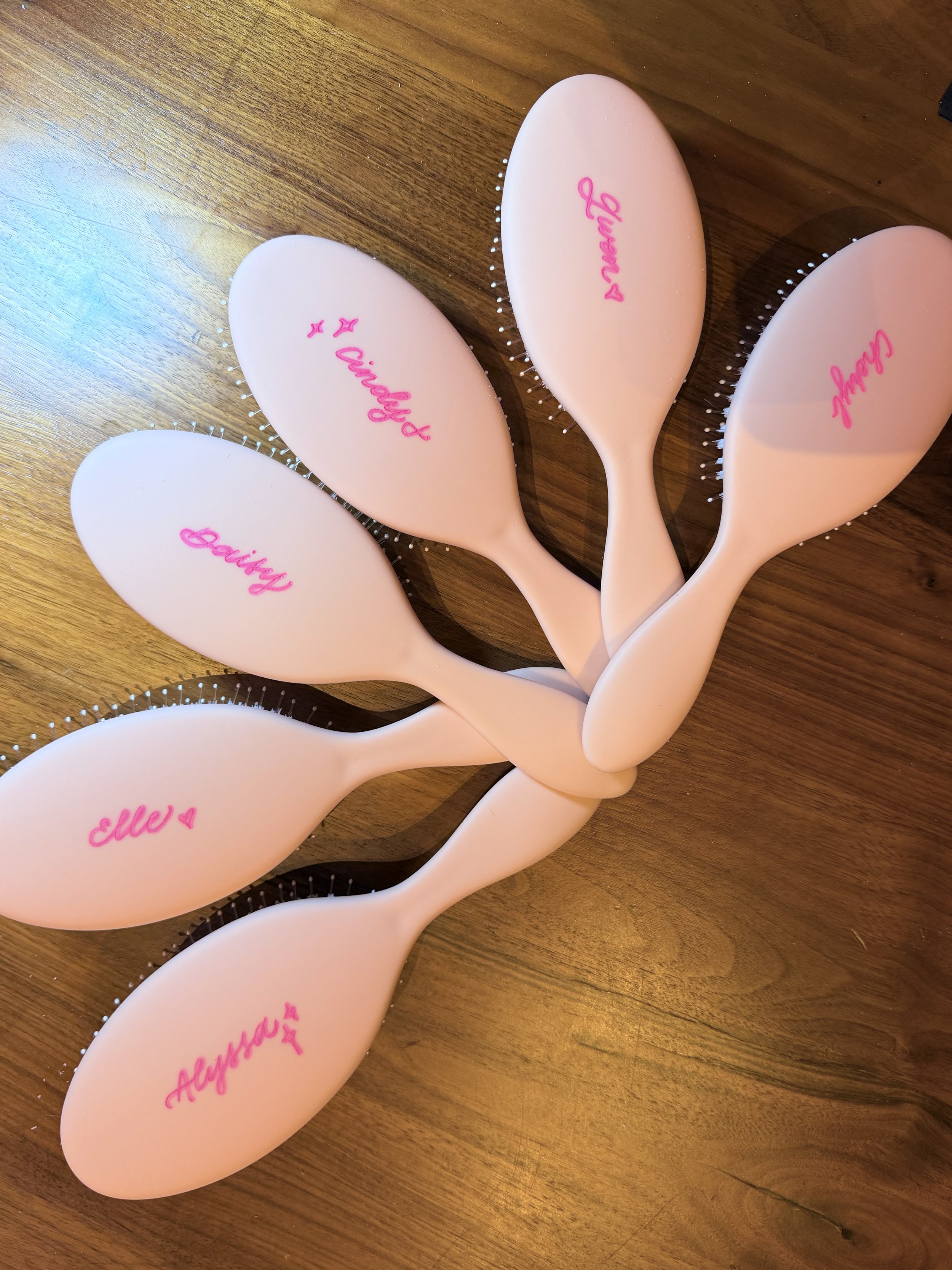 Live engraving on hair brushes for Dae Hair Los Angeles brand activation 