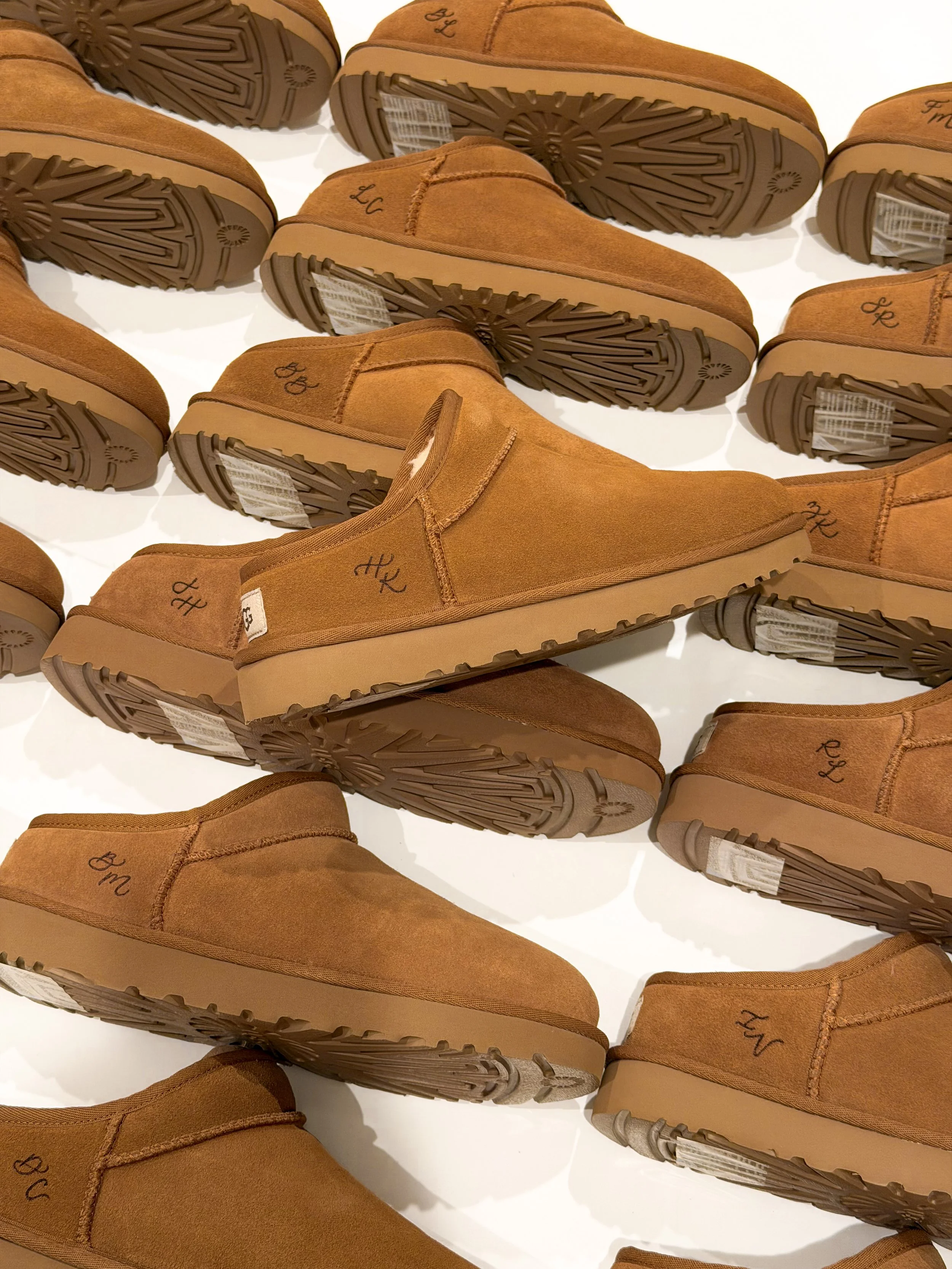 Custom debossed leather burned UGG slippers for PR gifting by Ink and Innuendos Orange County