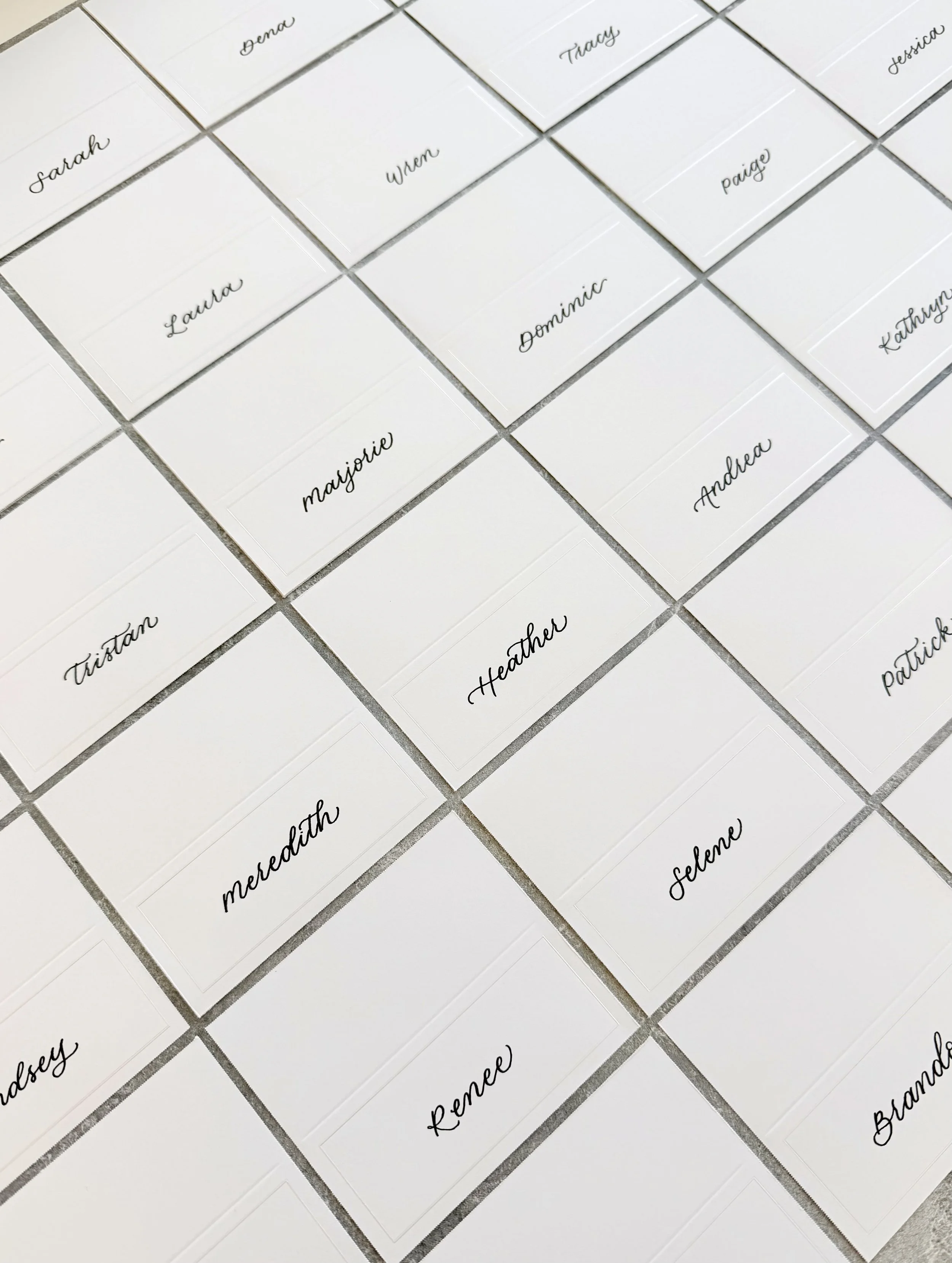 Hand calligraphy on place cards for private event in Orange County 