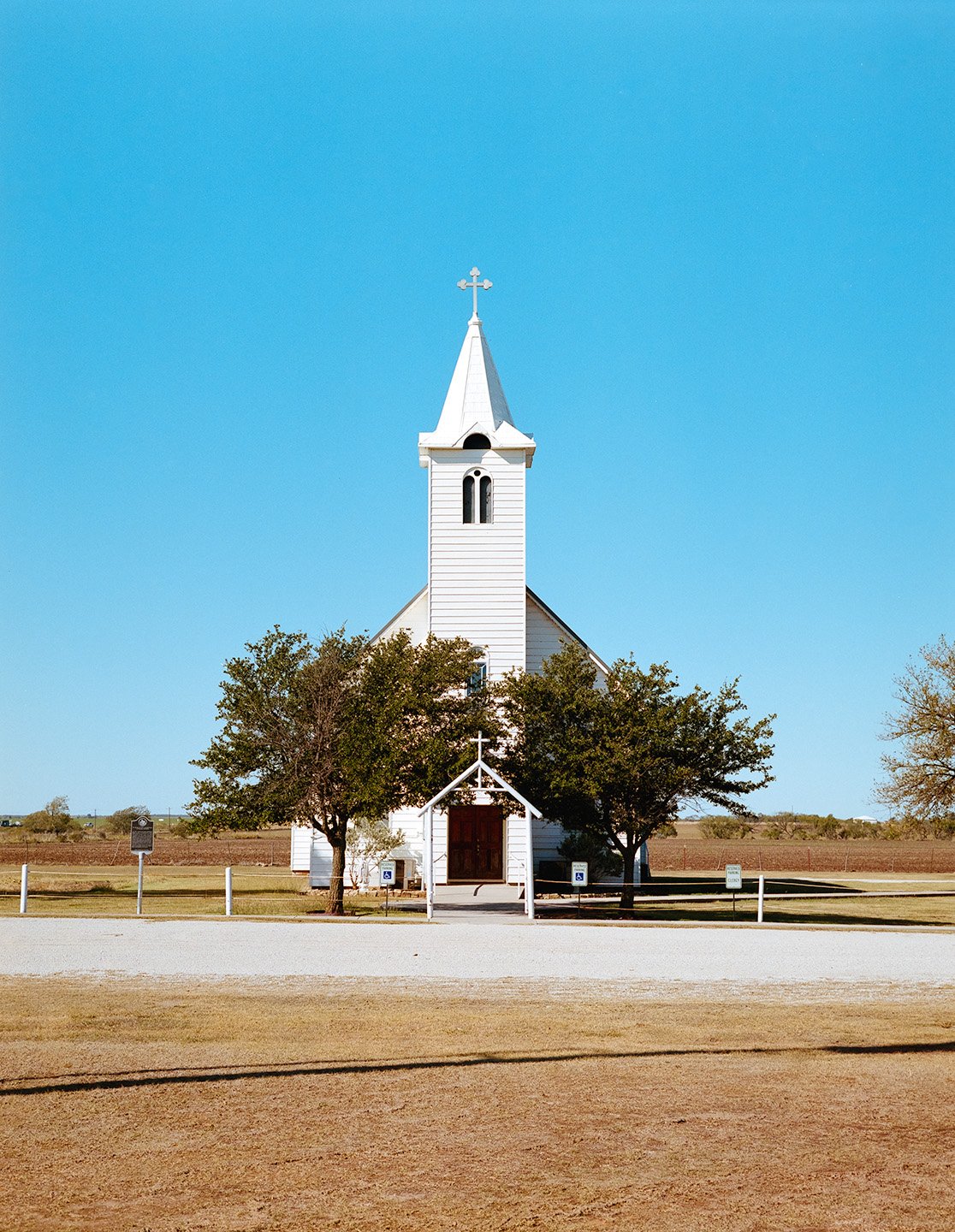 Megargel, Texas. Old Western catholic church in West Texas field.