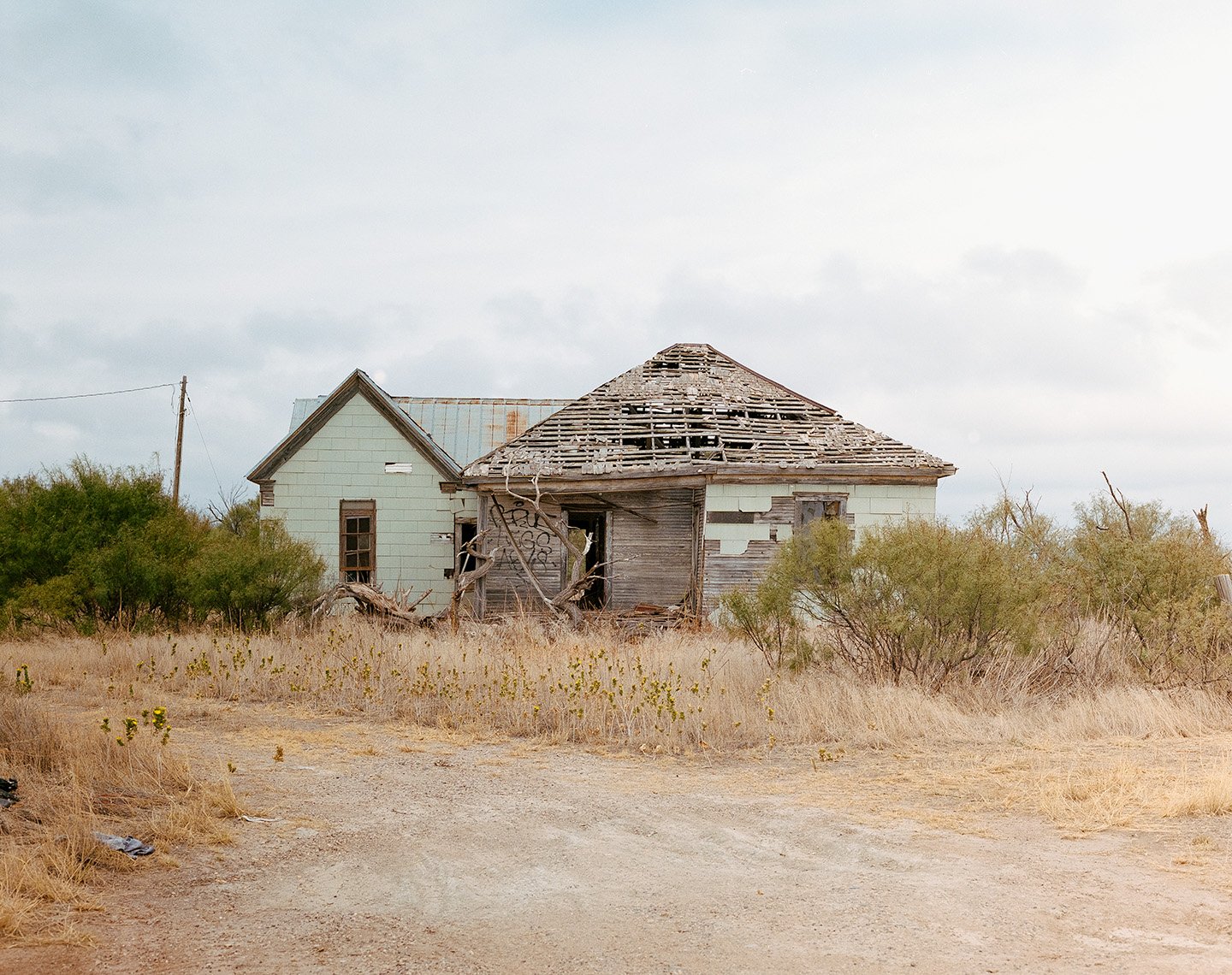 Abandoned house in a west Texas field, western art, abandoned building photography art.