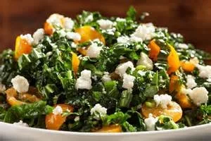 Shredded Kale Salad with Tomatoes, Olives and Feta