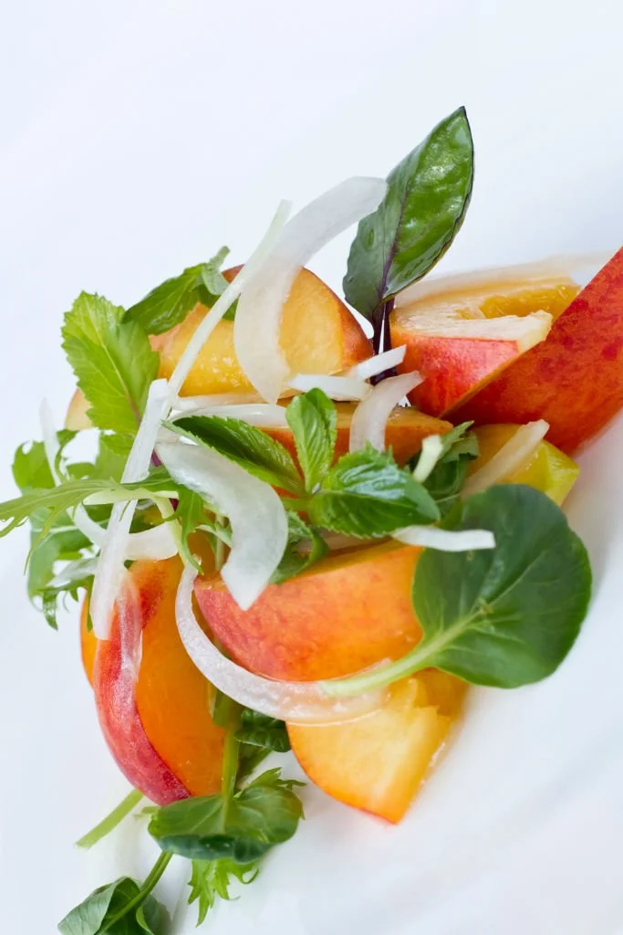 Peach and Sweet Onion Salad over Summer Lettuce