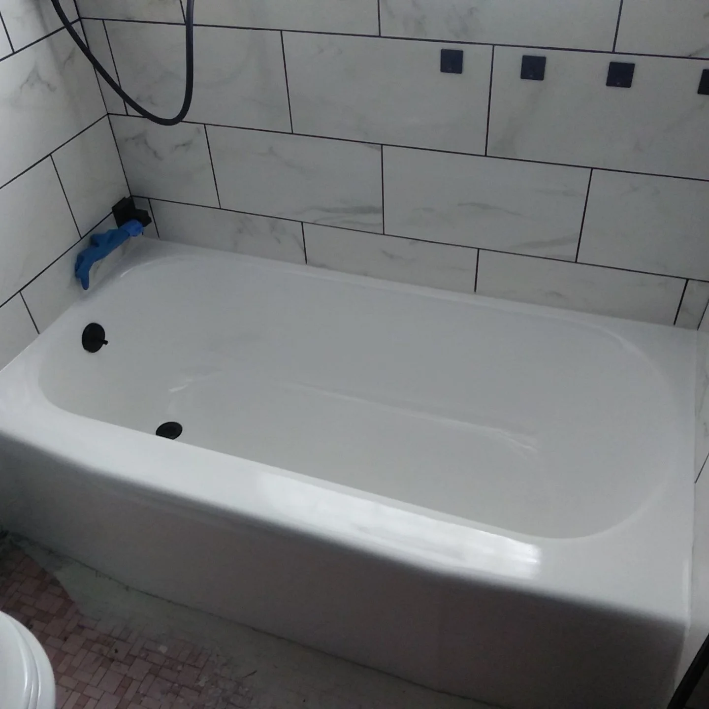 Recently completed bathtub tub shower refinishing resurfacing reglazing