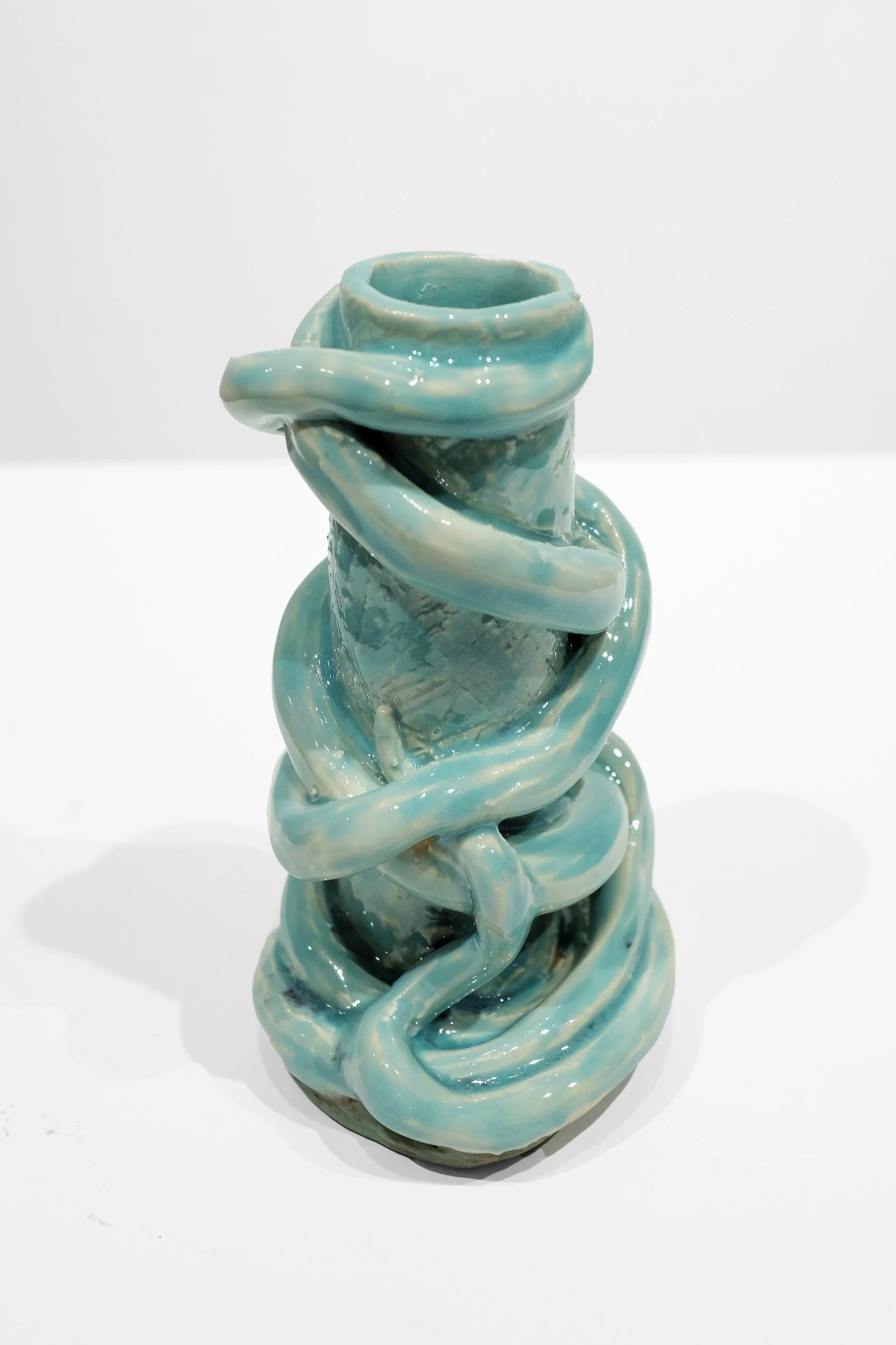 White stoneware, blue glaze, H: 5 x W: 3 x D: 1.2 Inches