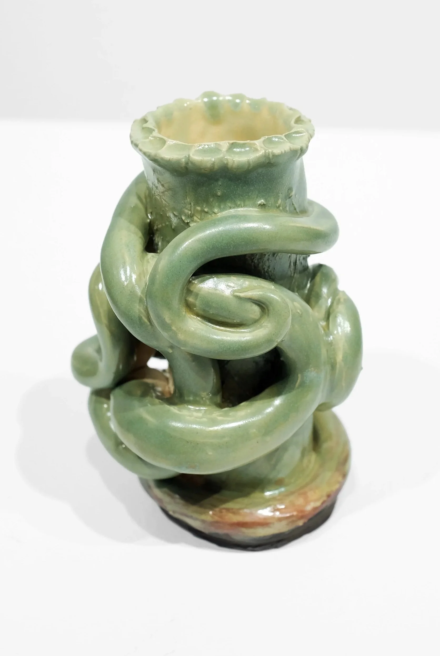 White stoneware, green glaze, H: 4 x W: 3 x D: 1.5 Inches