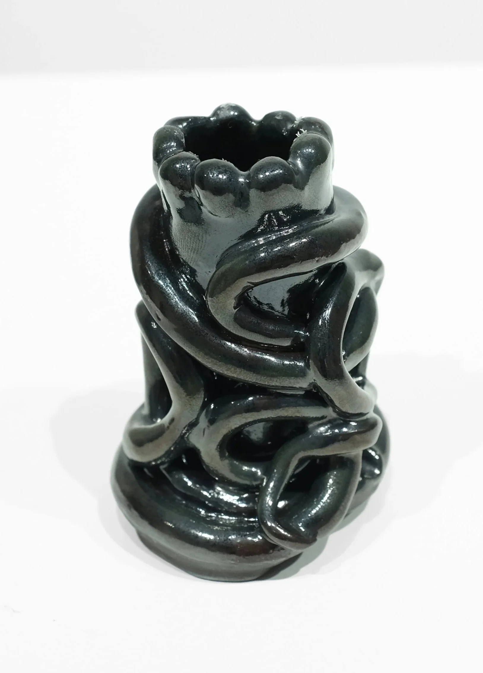 White stoneware, black glazes, H: 3 x W: 2.5 x D: 1 Inches