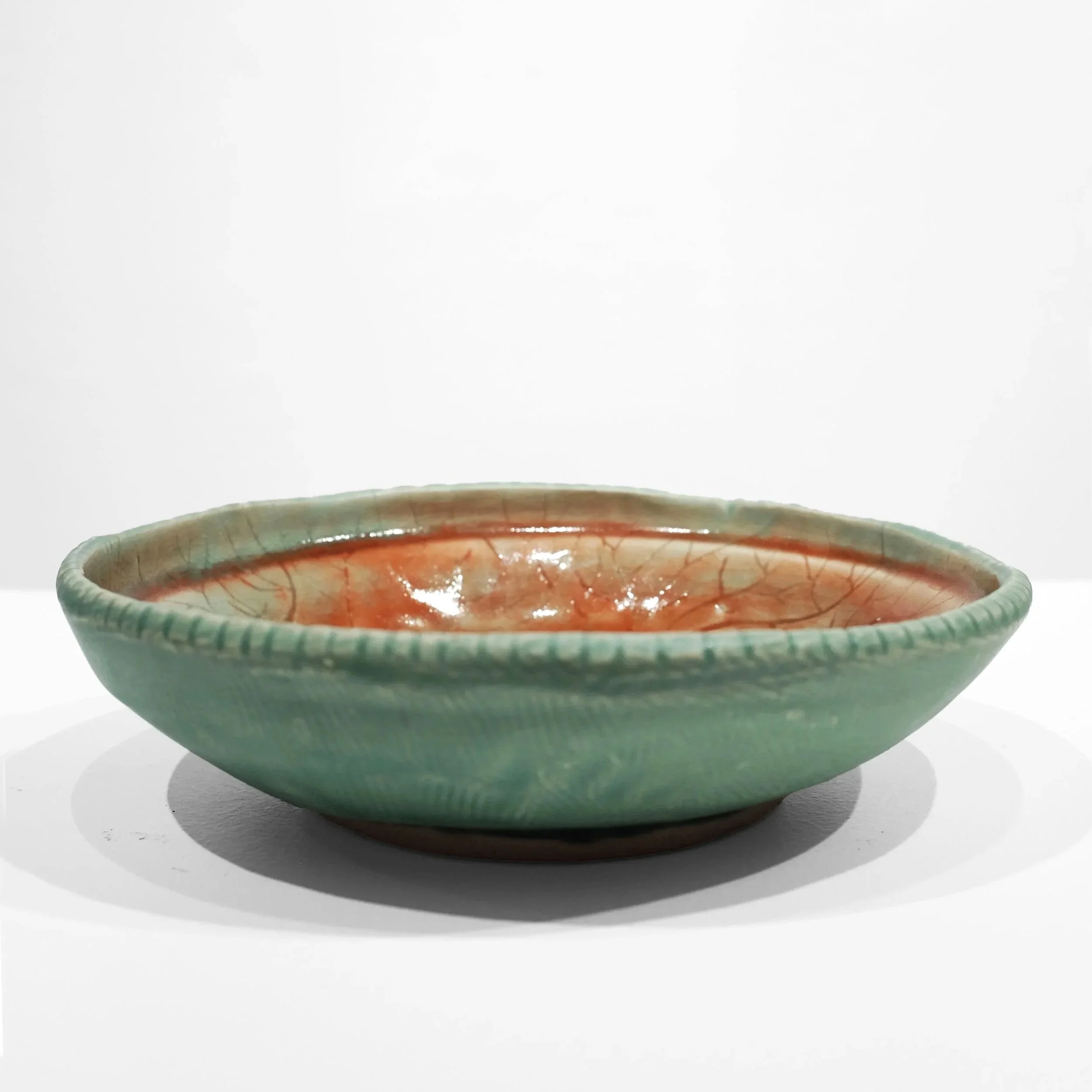 White stoneware, mix glazes, H: 2 x W: 7 x D: 7 Inches