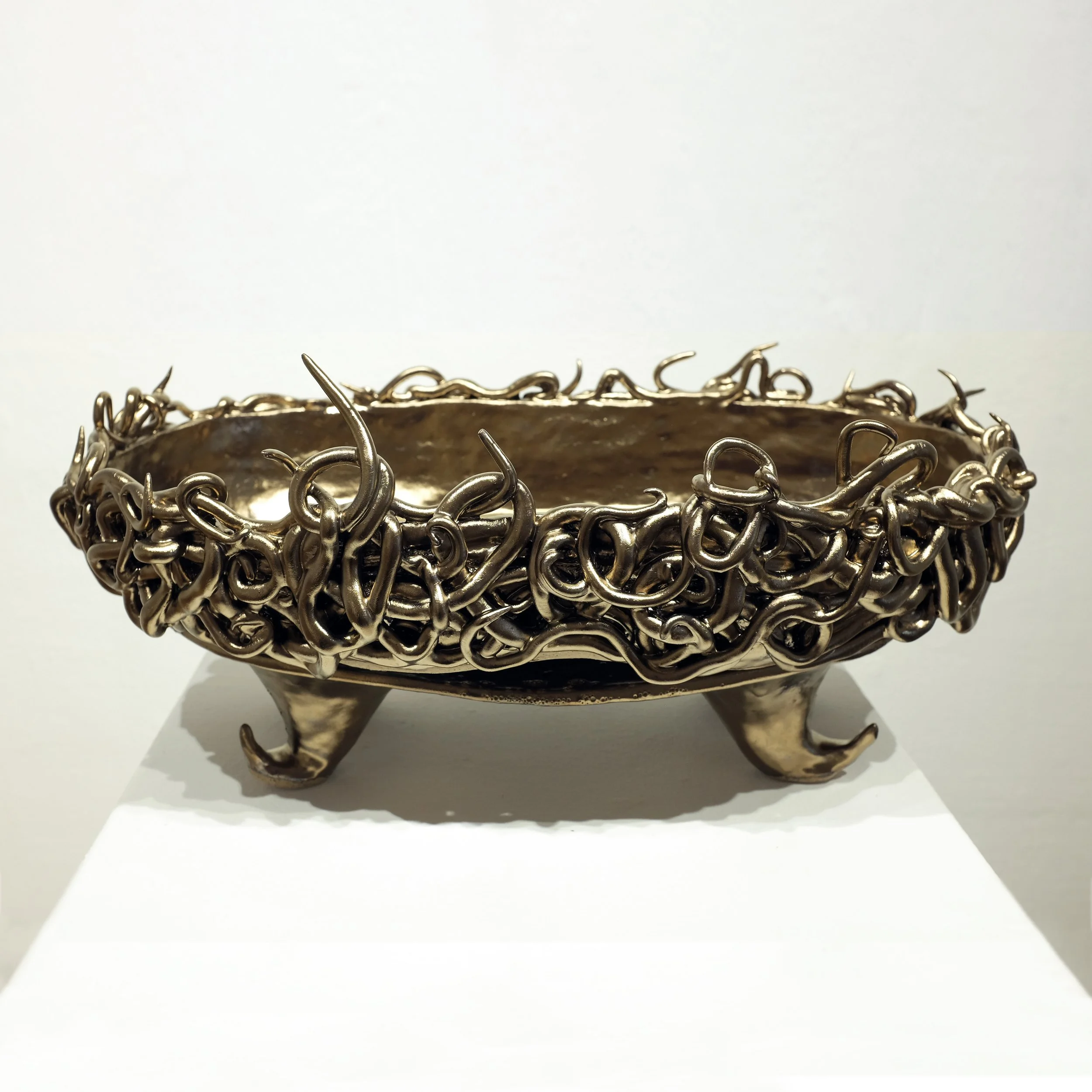 Ceramic stand, white stoneware, gold glaze, H:9" x W:19" x D:12"