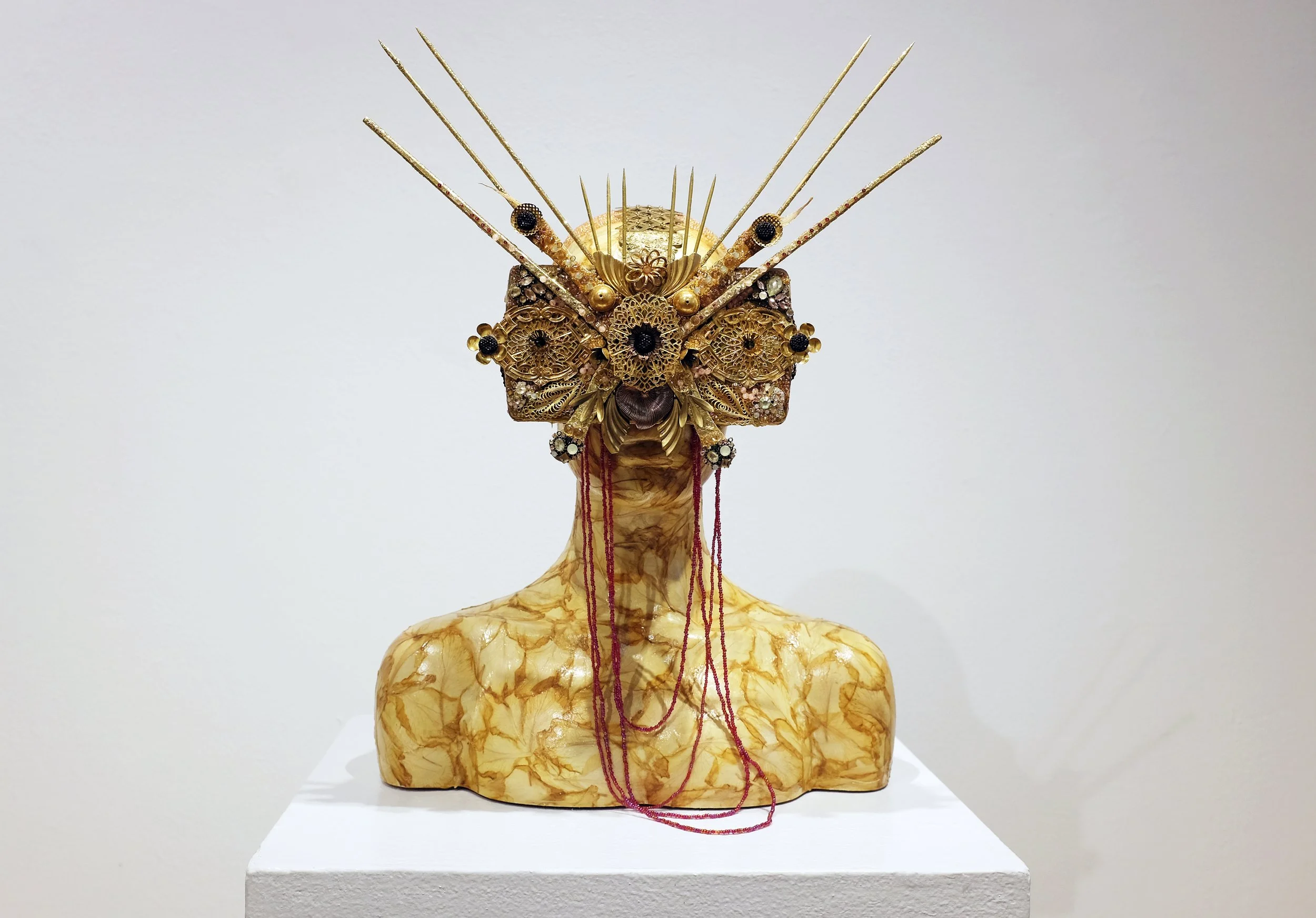 Eyes Of My Skin IV, 2025, mannequin parts, plaster, VR helmet, sticks, jewelry, flower petals, beads, medium, H:25"xW:16"xD:8"