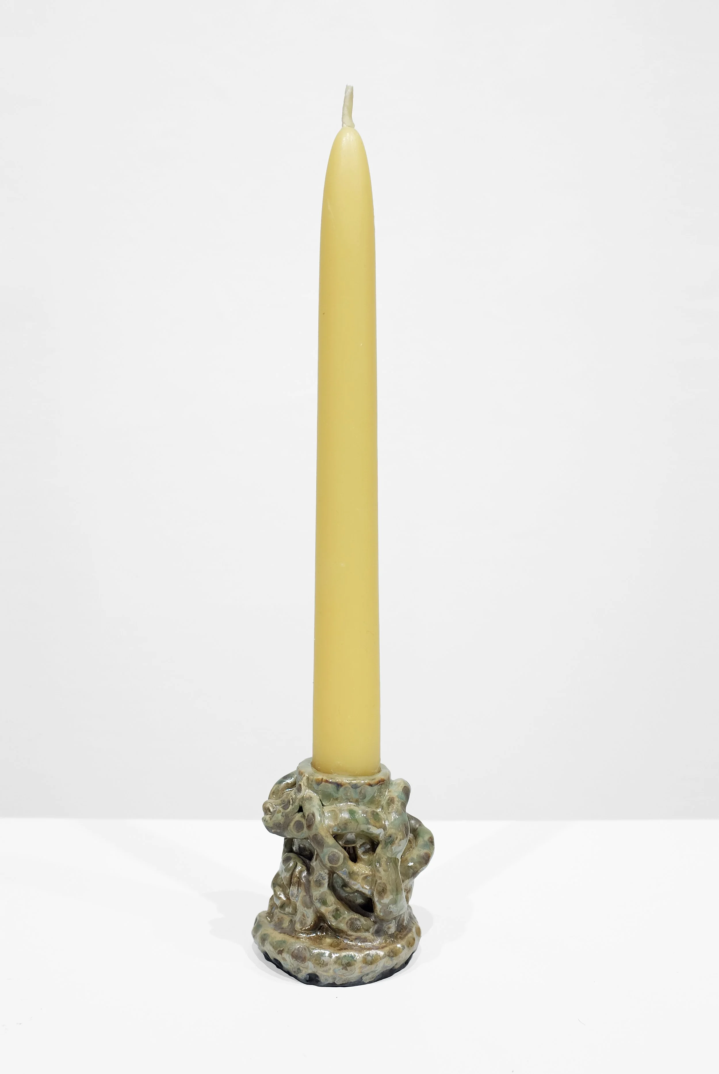 White stoneware, mix glazes, H: 2.5 x W: 2.5 x D: 1 Inches