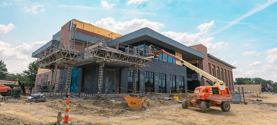 View of One Alliance Place from the northwest corner. The black brick section on the lower floor is where the coffee shop will be.