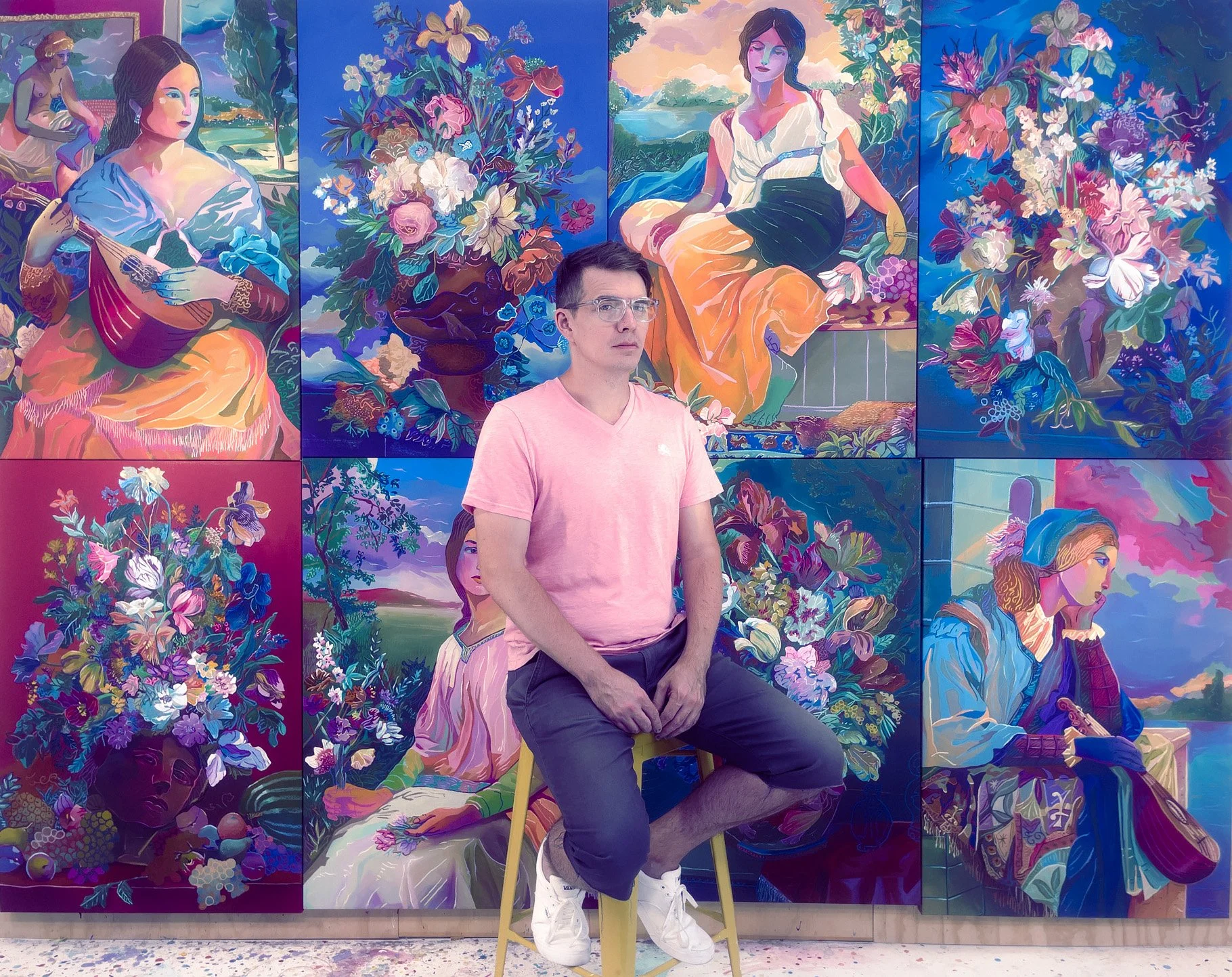 john holcomb. kansas artist show in studio, 2021. the 6 "the original" genre paintings behind him.