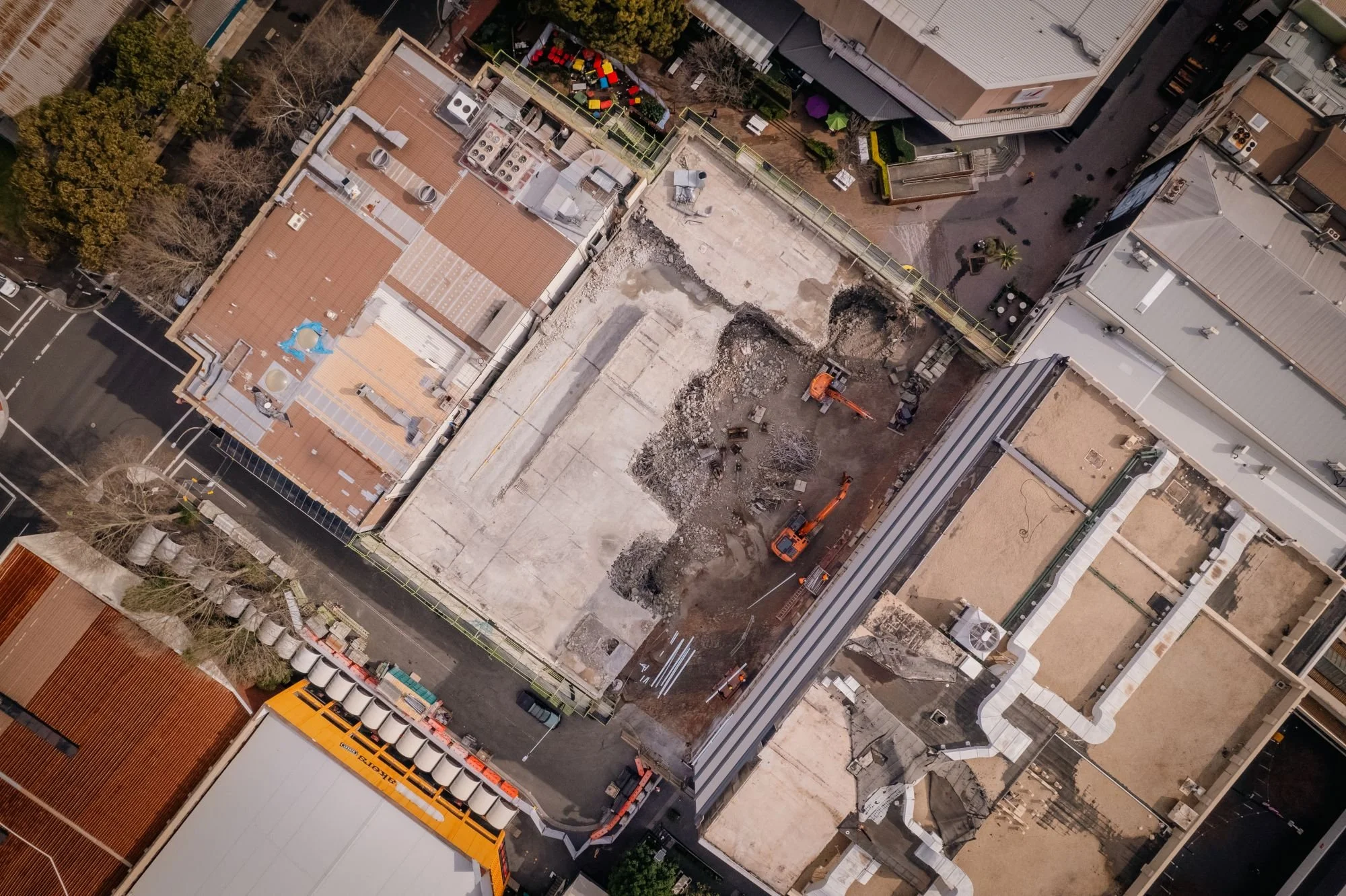 Demolition Progress Advances Across David Jones Building, Car Park and Diggers Club at The Globe Development.
