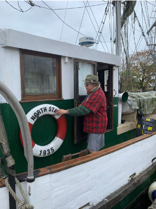 June Harrison | North Star's 4th owner | back of the boat.png