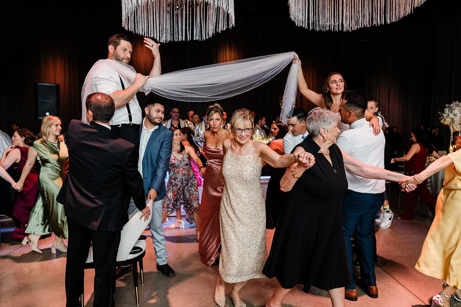 guests dance in the ballroom at The Canvas Venue in Wheeling
