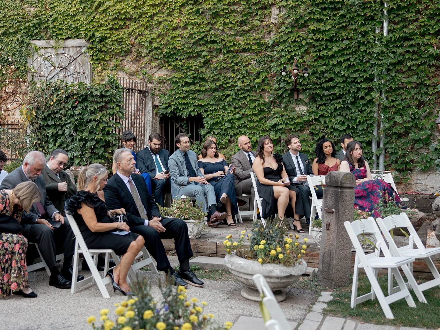 raised platform seating at outdoor ceremony at Salvage One in Chicago