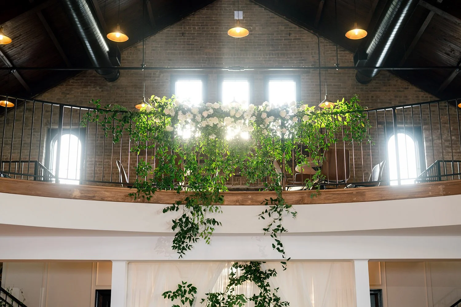 balcony with greenery and florals at The District in Richmond IL