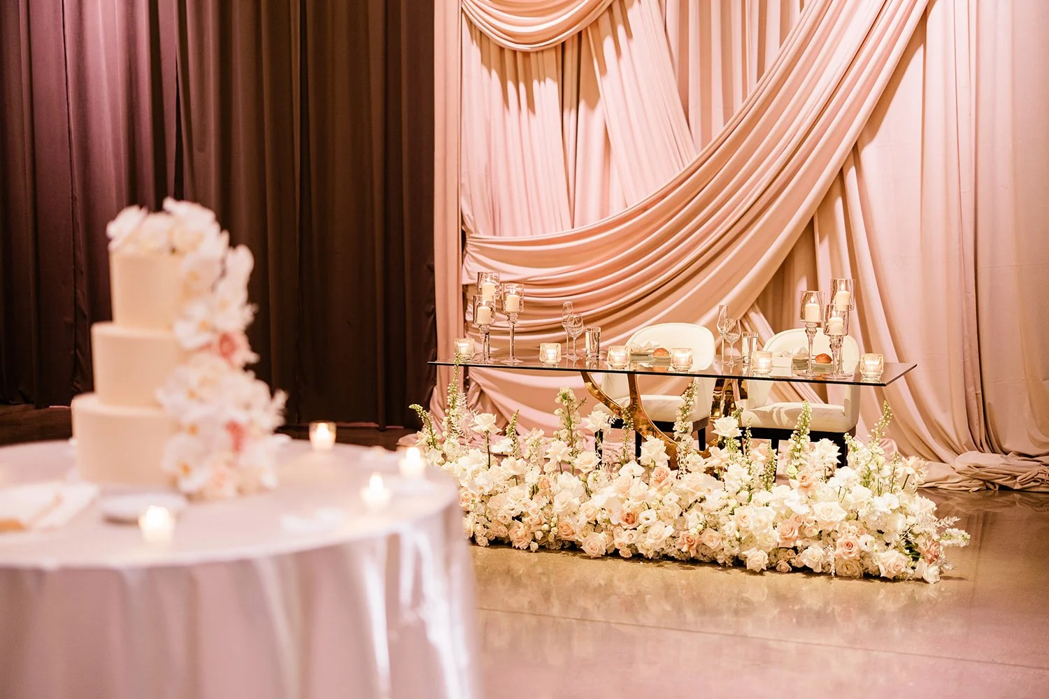 sweetheart table and cake table at The Canvas Venue in Wheeling