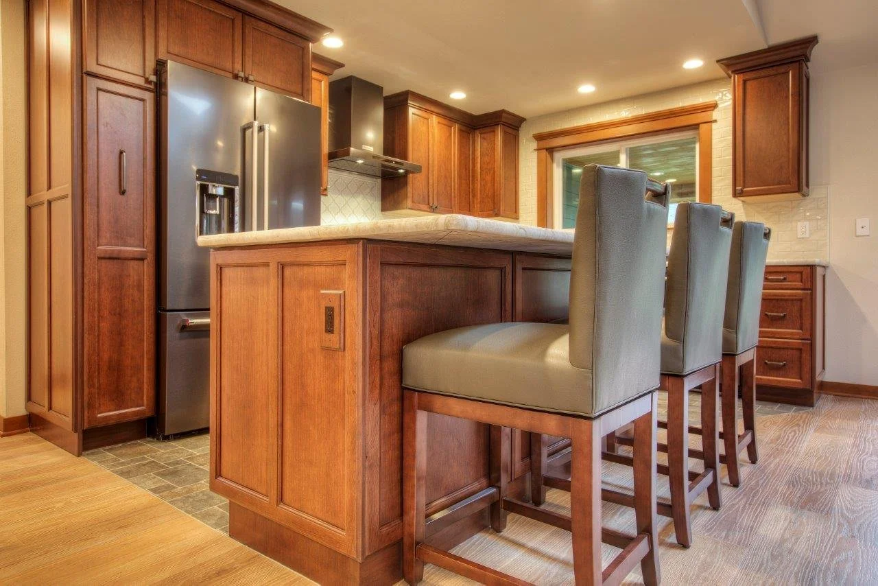 Kitchen remodel in Tacoma featuring a custom wood island with bar seating.