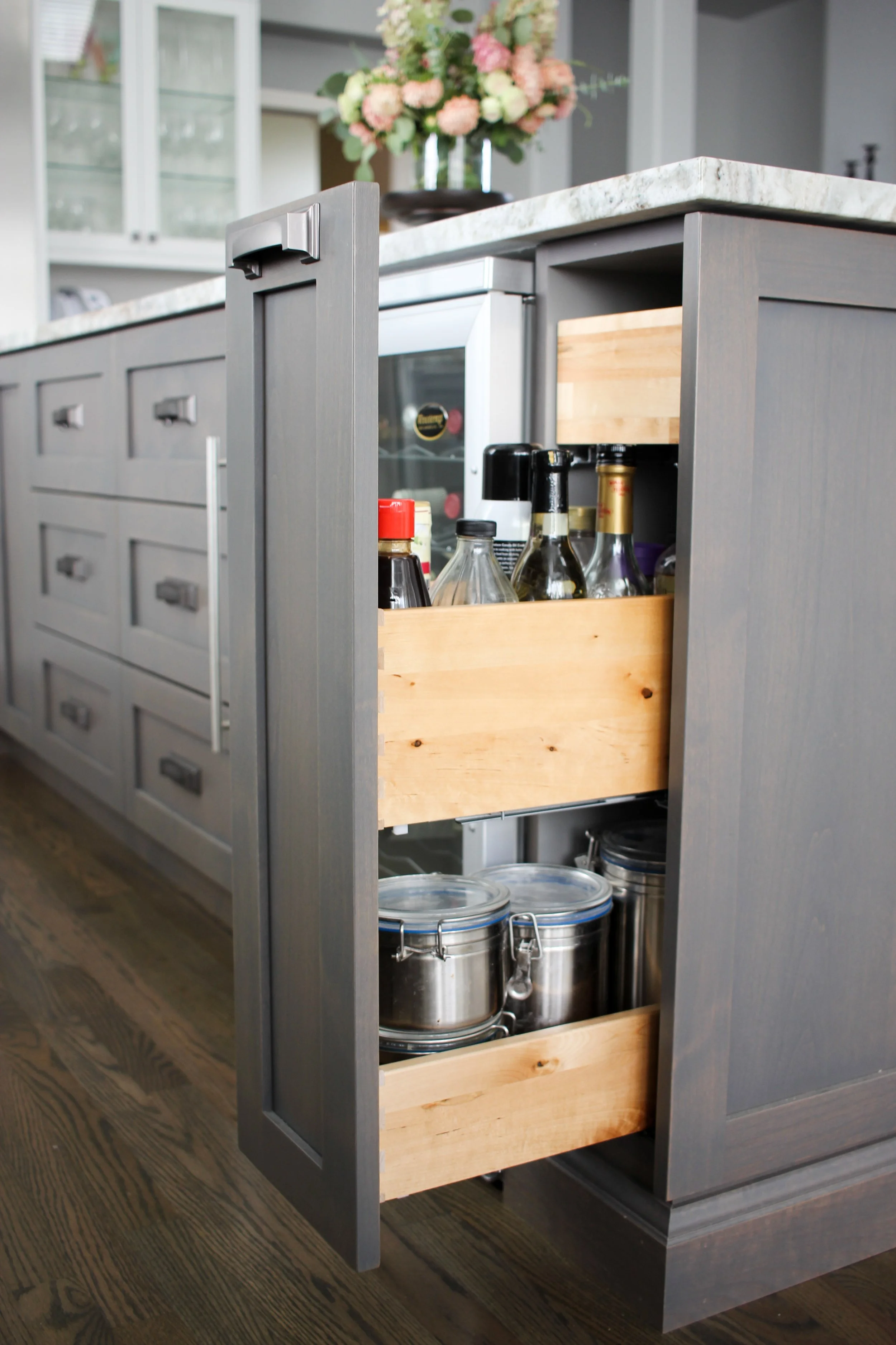 Custom pull-out cabinet storage in a Tacoma kitchen island remodel.