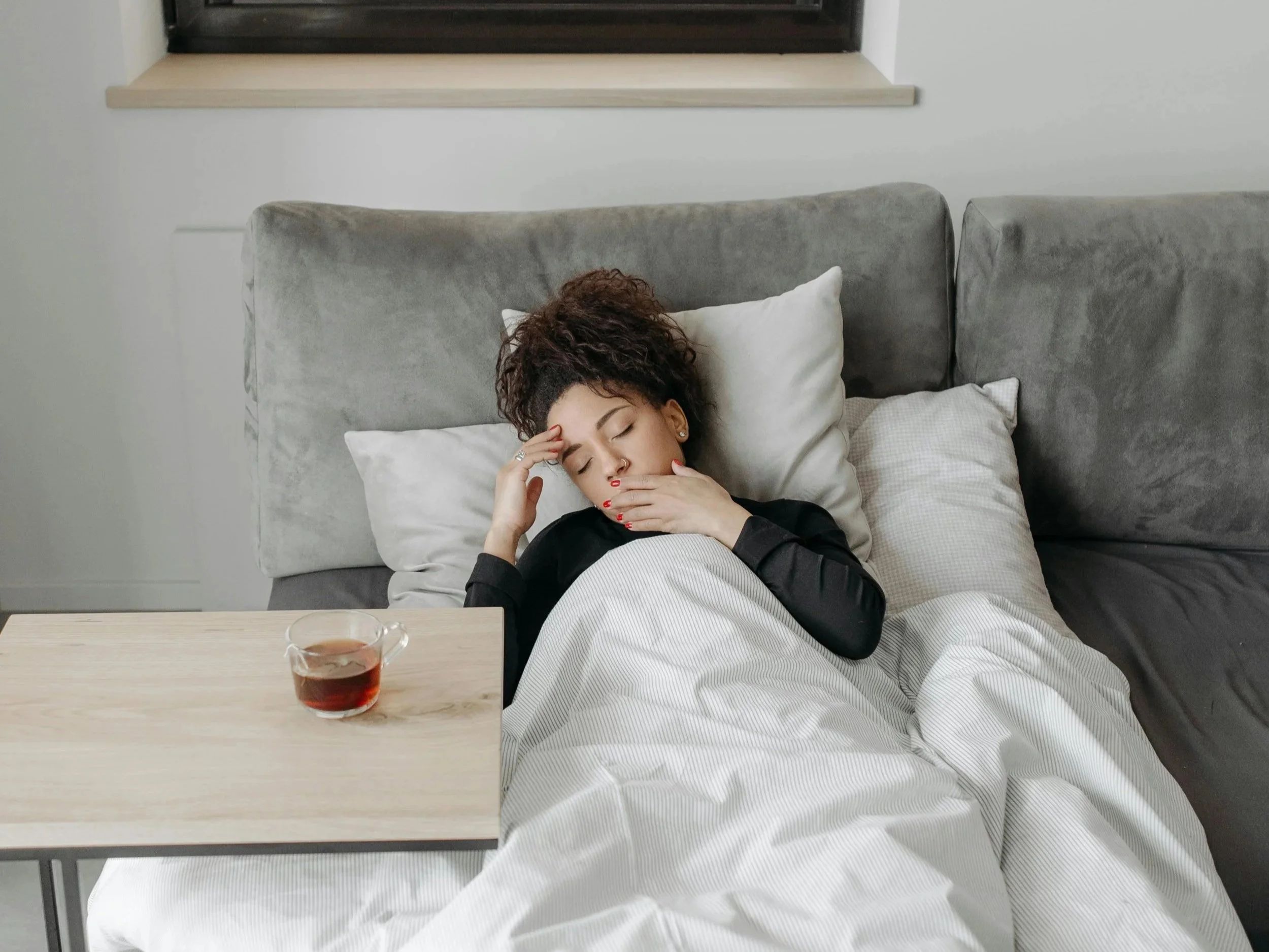 woman in bed with seasonal affective disorder