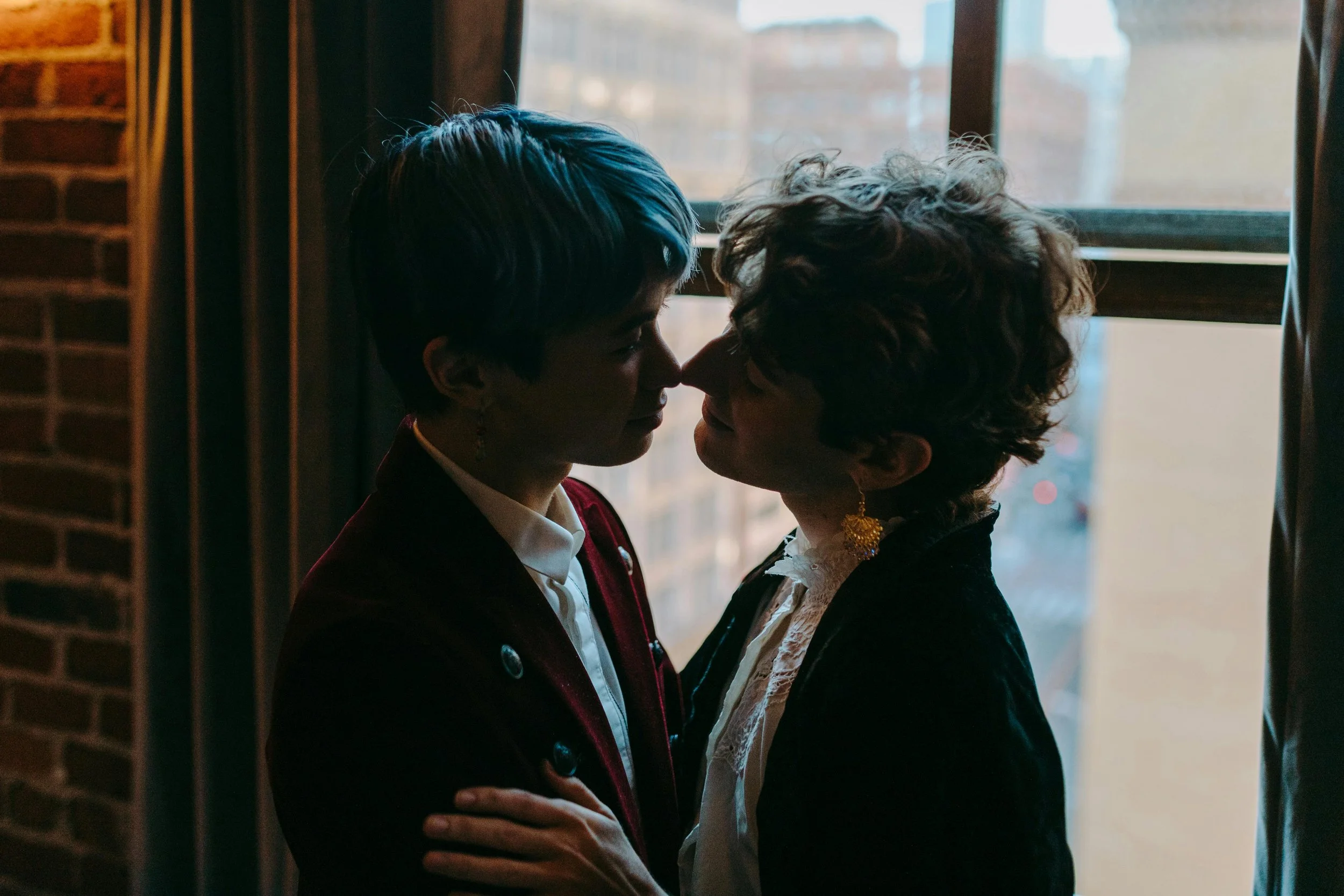 queer couple about to kiss