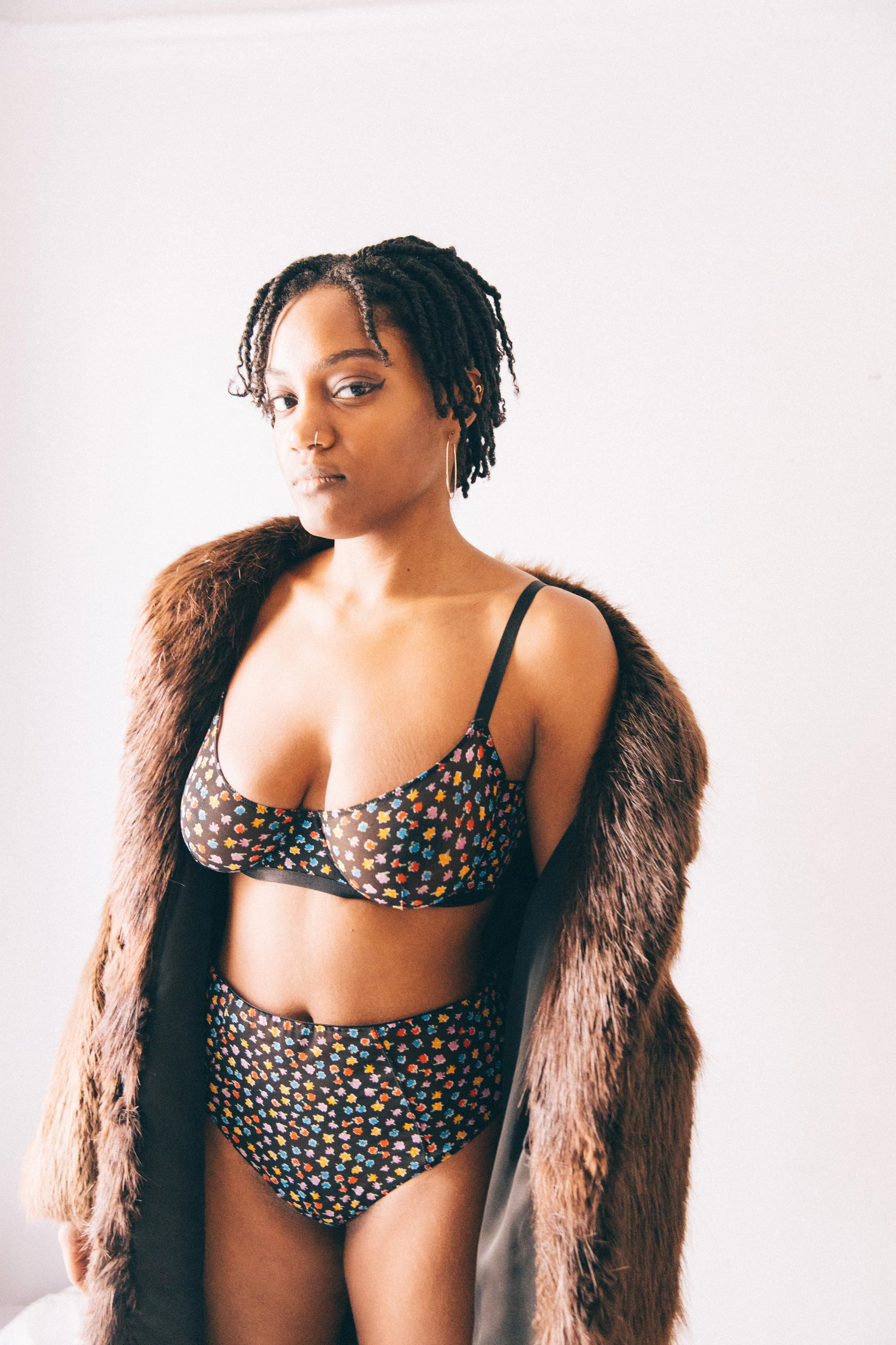 portrait of black woman in polka dot top