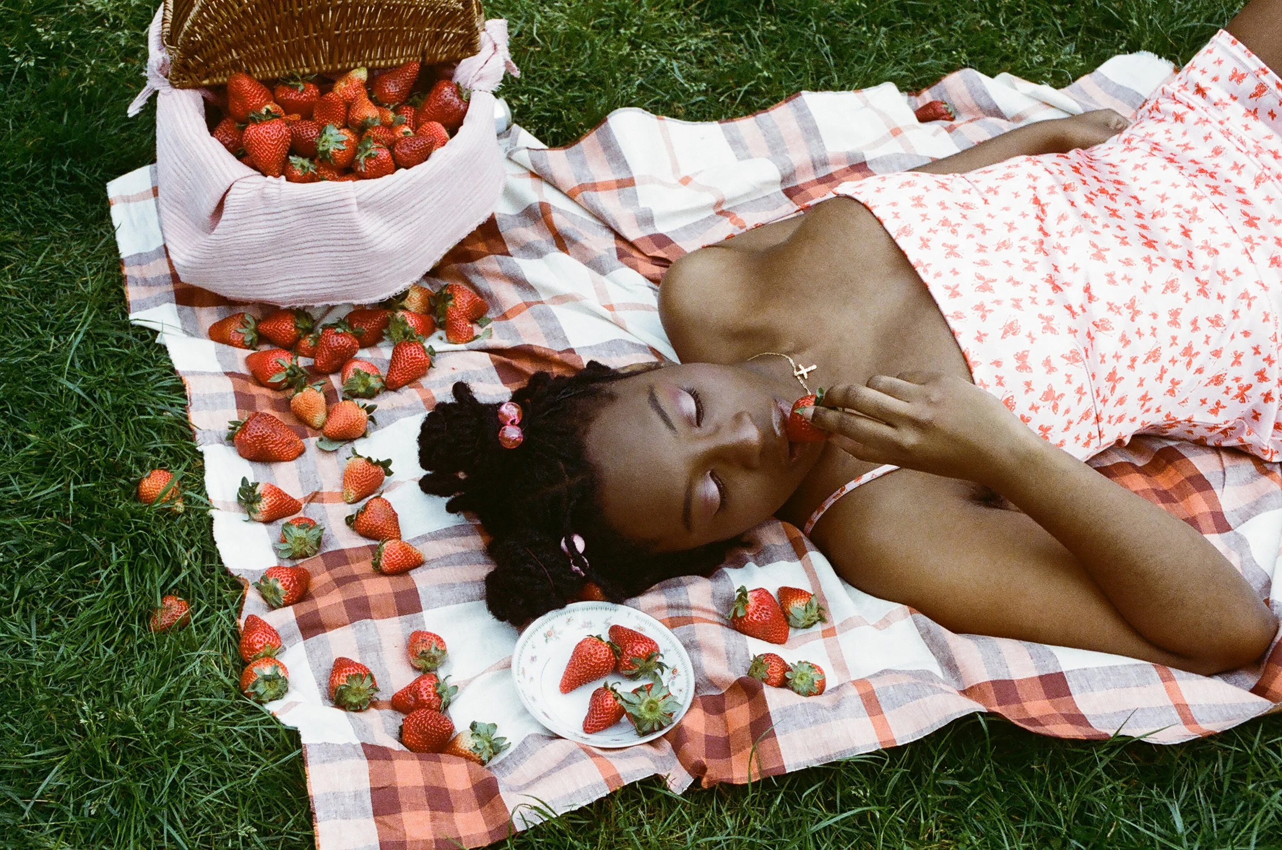 woman having a picnic in grass field