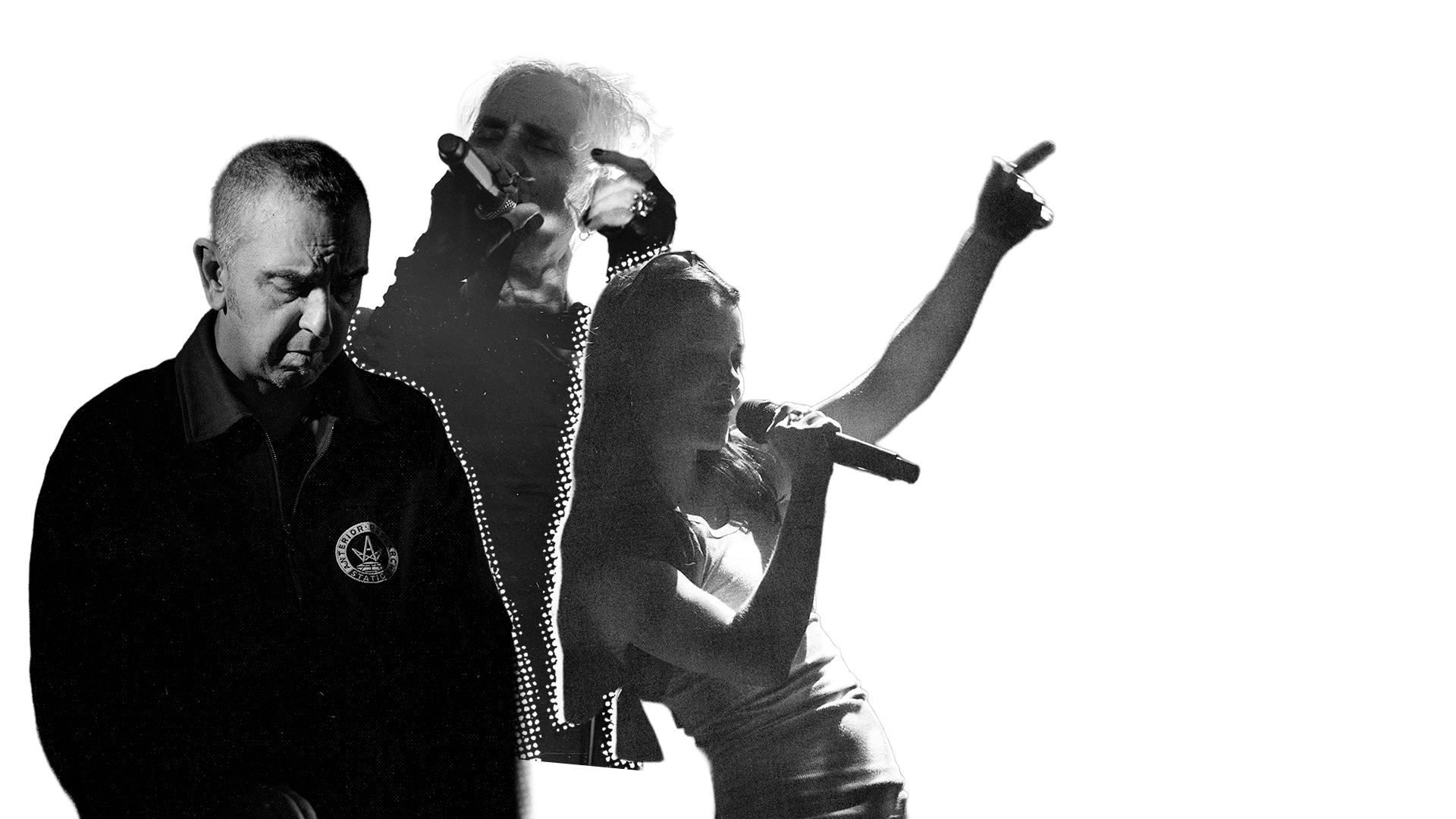 Black and white photo of three singers performing on stage, one man and two women, with microphones, with the background partially highlighted.