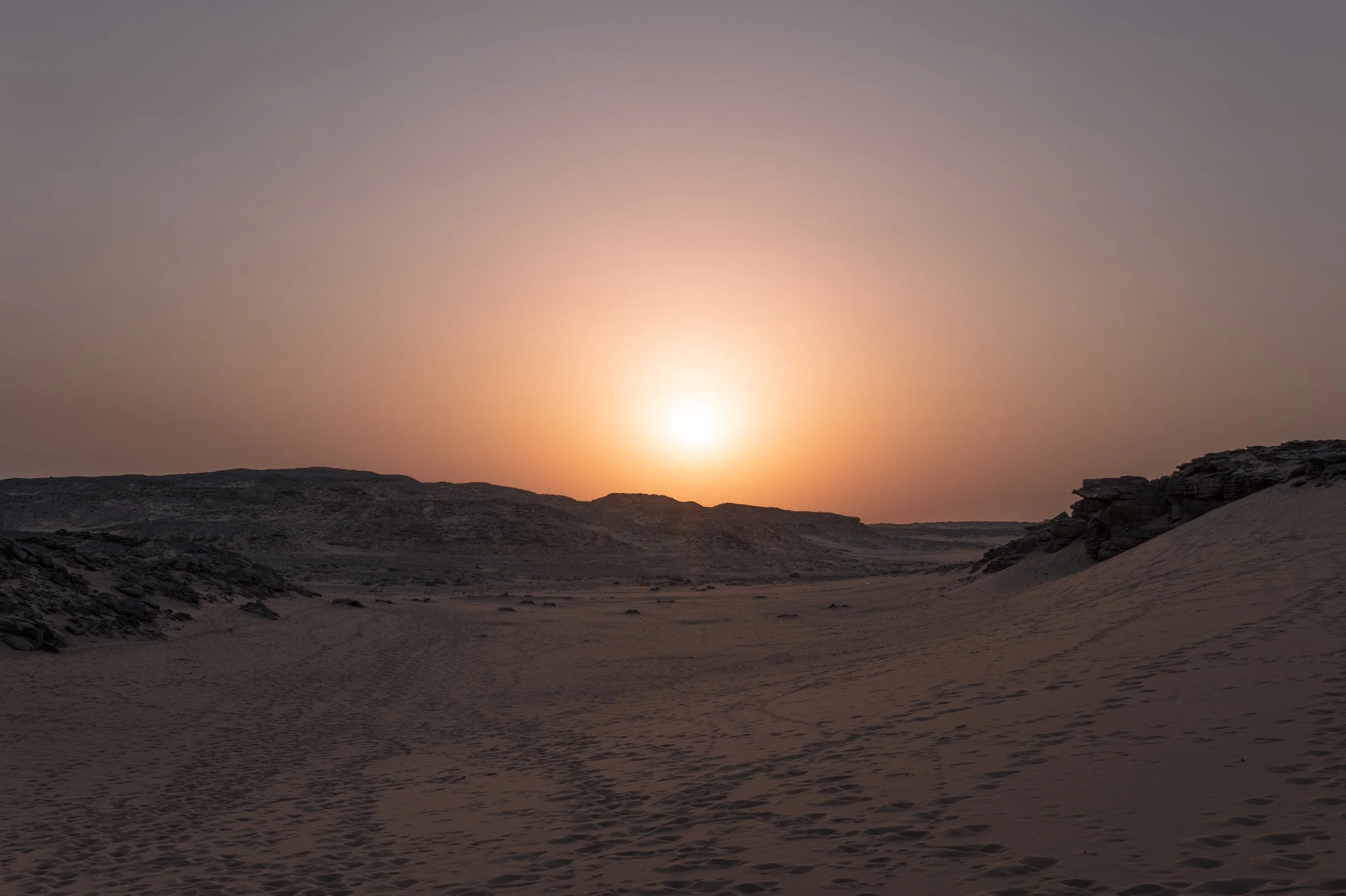 A desert walk leading to Libya