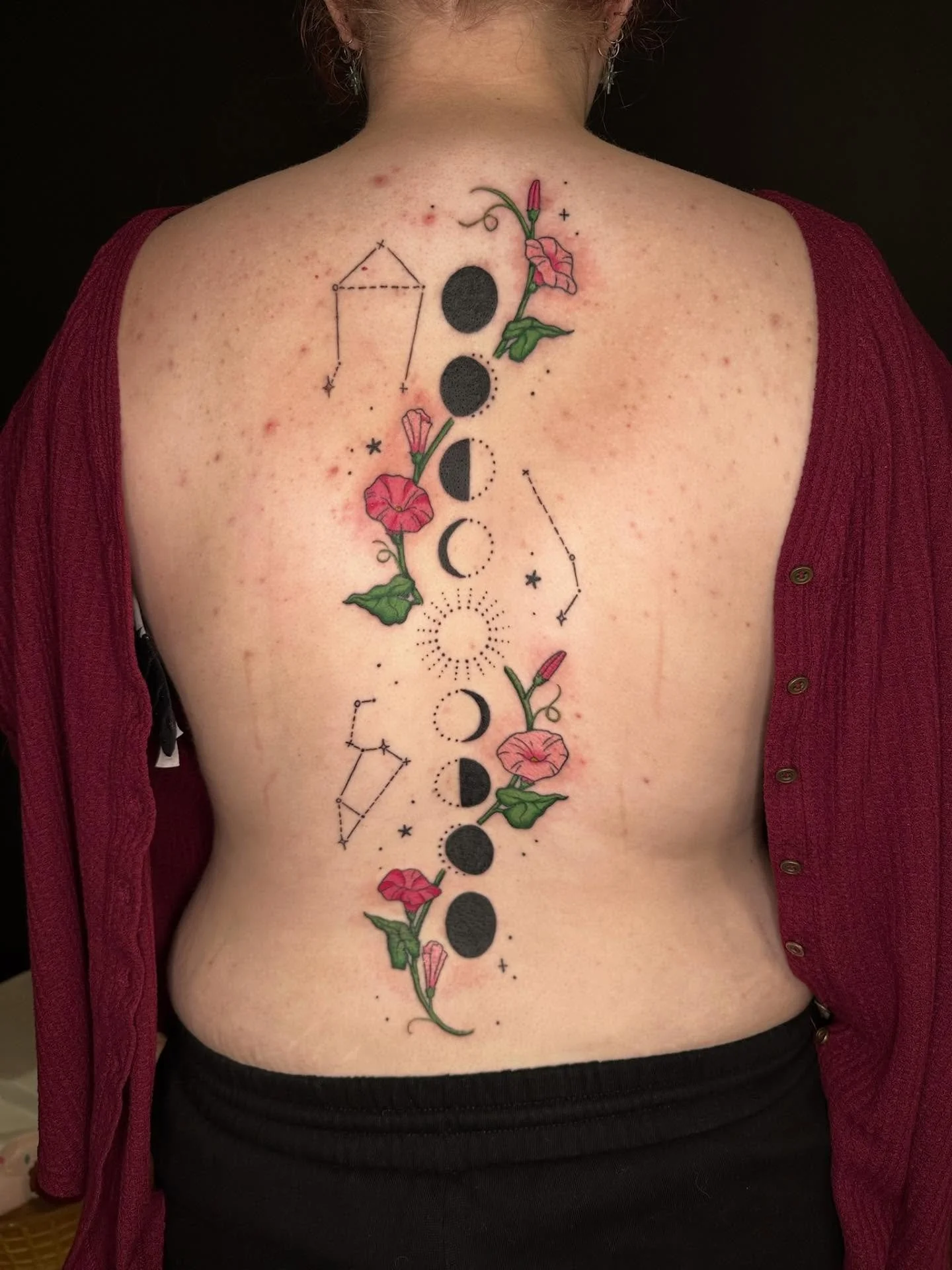 Finished up this lovely floral spine piece for Emma!!!!!🌸🌝🌺

The color and solid black in the moon are fresh but the lines are healed!! 

Booking January and February @darkartstattoomd just send a DM or my booking form for a spot💖