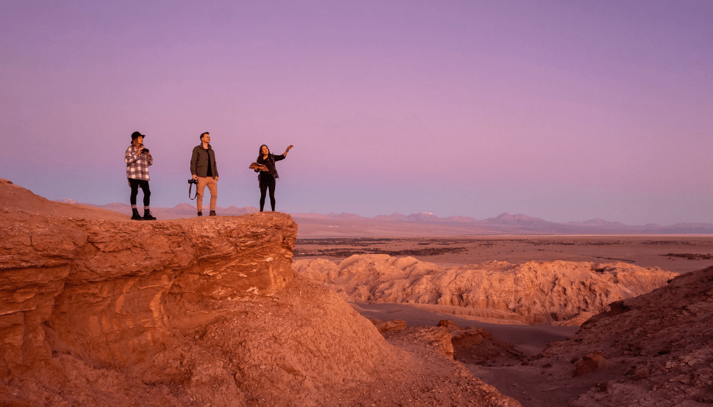 Otherworldly rock formations and salt-dusted desert landscape of Vallecito in the Atacama Desert Chile at golden hour