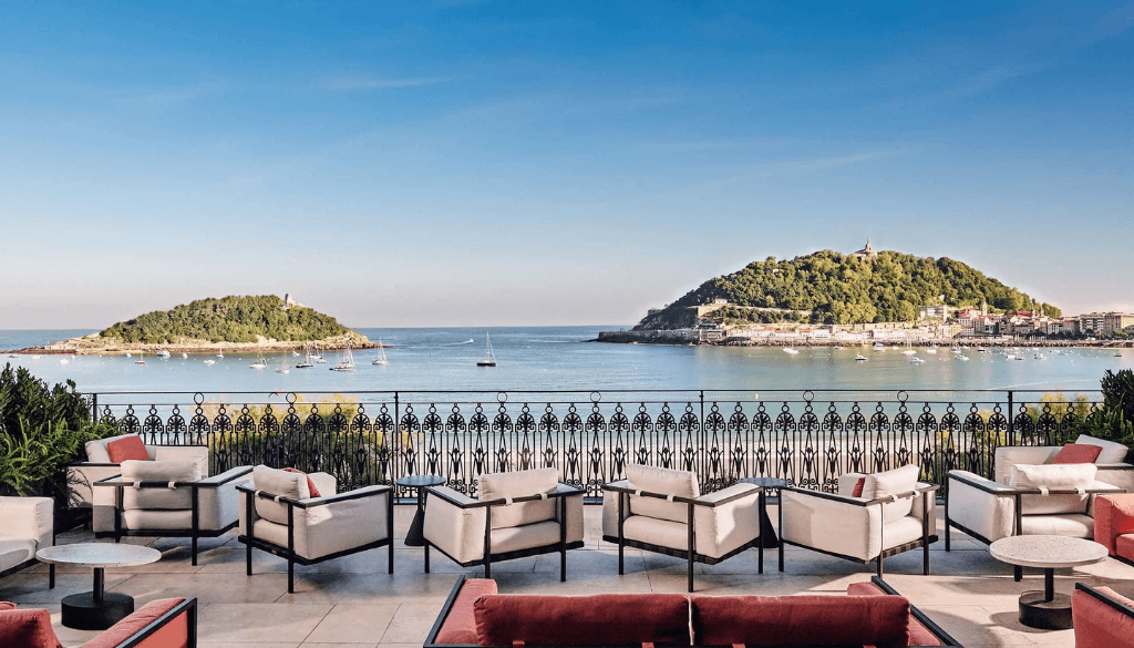 Modern minimalist interior of Nobu Hotel San Sebastián with floor-to-ceiling windows overlooking La Concha Bay in the Basque Country Spain