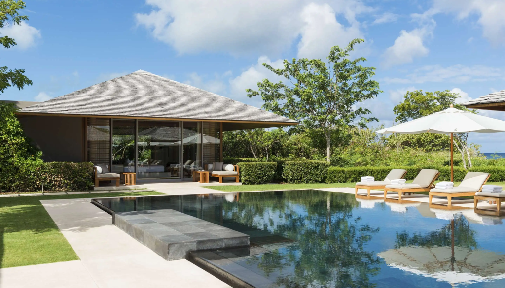 Six-bedroom pool villa at Amanyara resort in Providenciales Turks and Caicos with minimalist architecture, private pool, and views over the Caribbean Sea