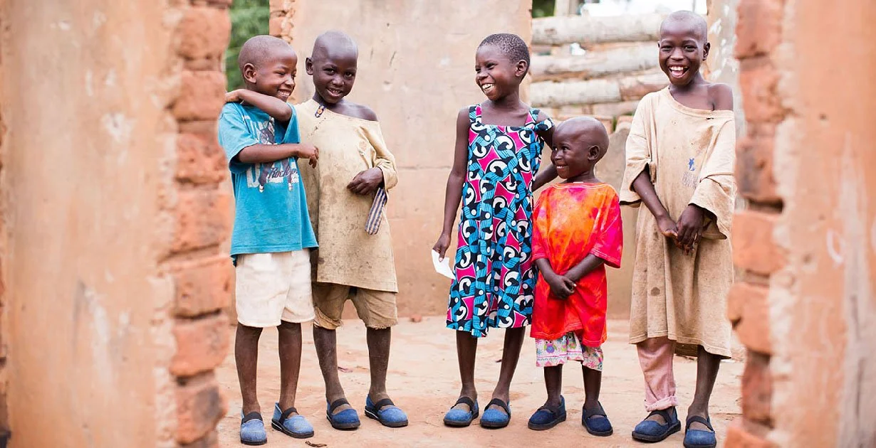 Child receiving foot care at a Sole Hope clinic
