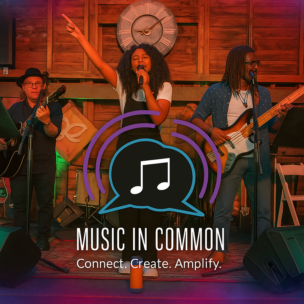 A Black female singer in overalls lifts her hand as she sings. A White musician in a hat and all black and an African American man in a blue shirt play their guitars alongside