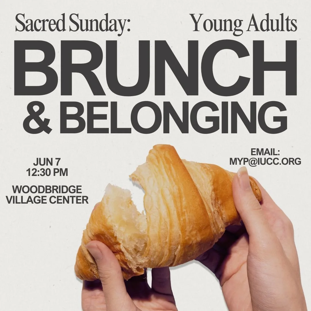 two hands pull apart a croissant