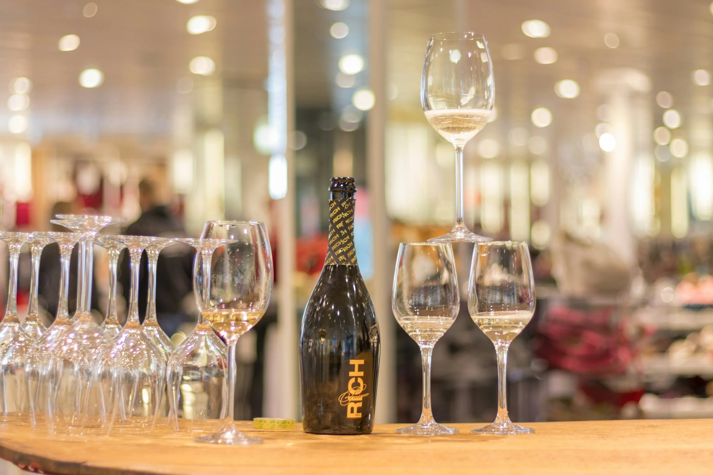 Champagne and glasses stacked