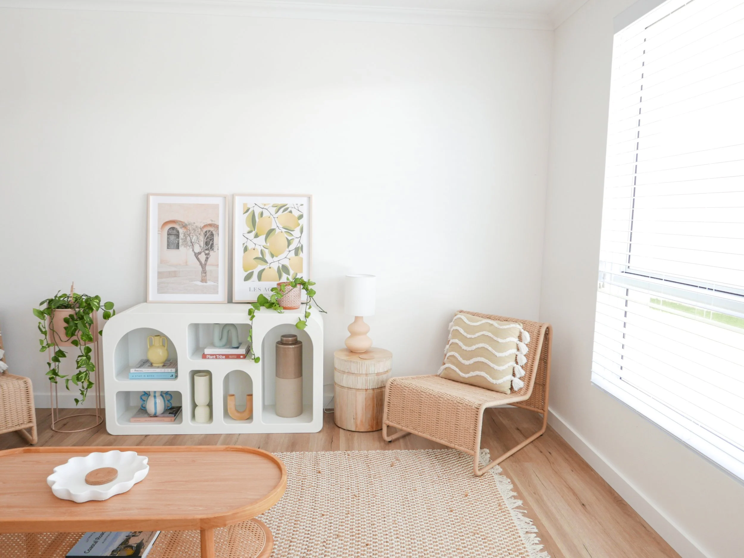 styled-bookshelf-corner-rattan-chair-ceramics-botanical-prints-interior-styling.jpg