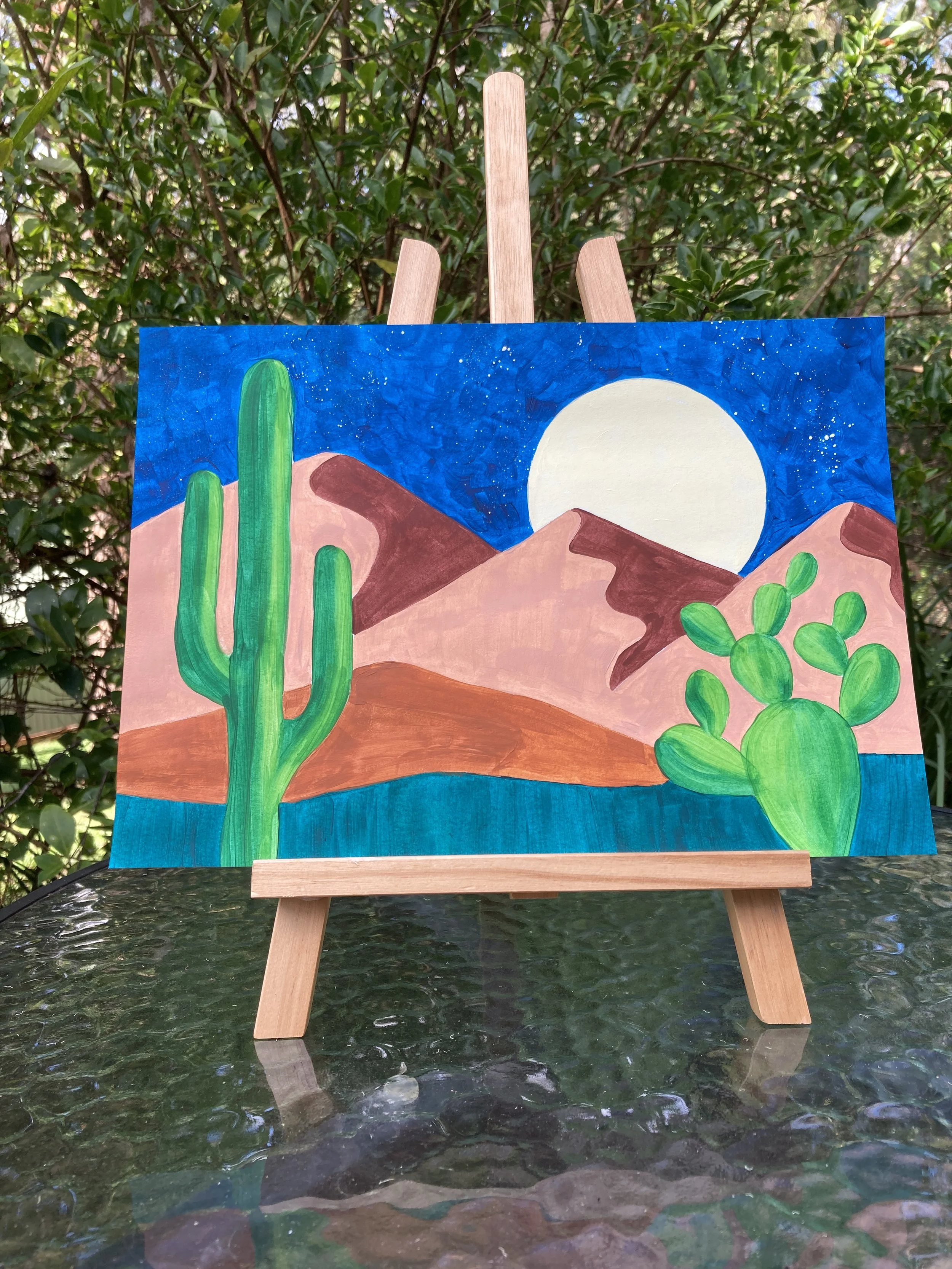 Moonlight Desert painting on easel.JPG