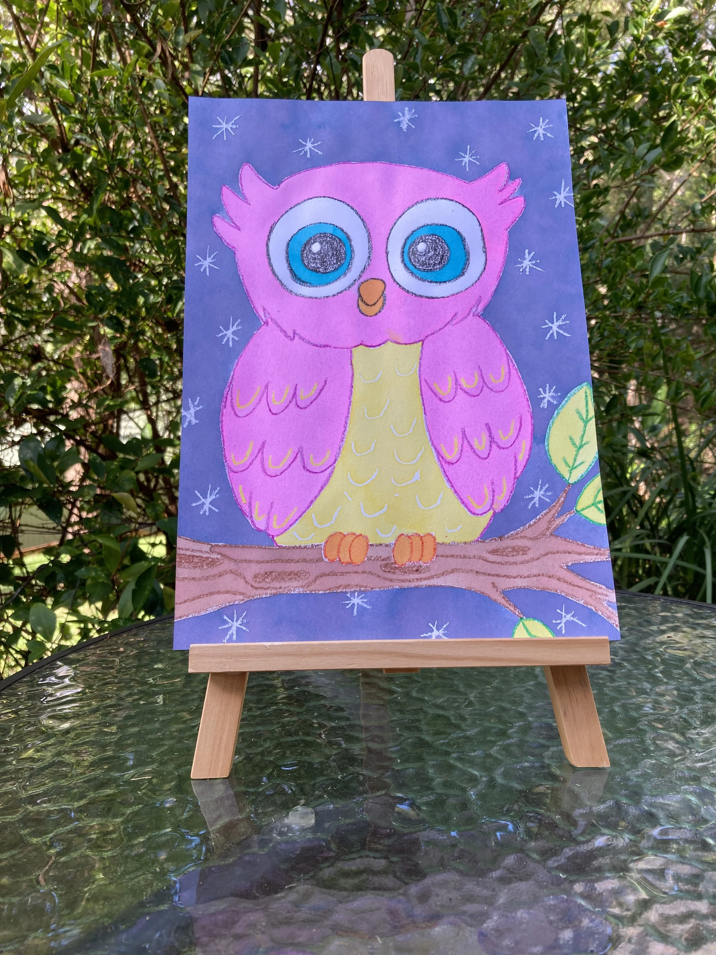 Colourful Owl liquid watercolour painting on easel.JPG