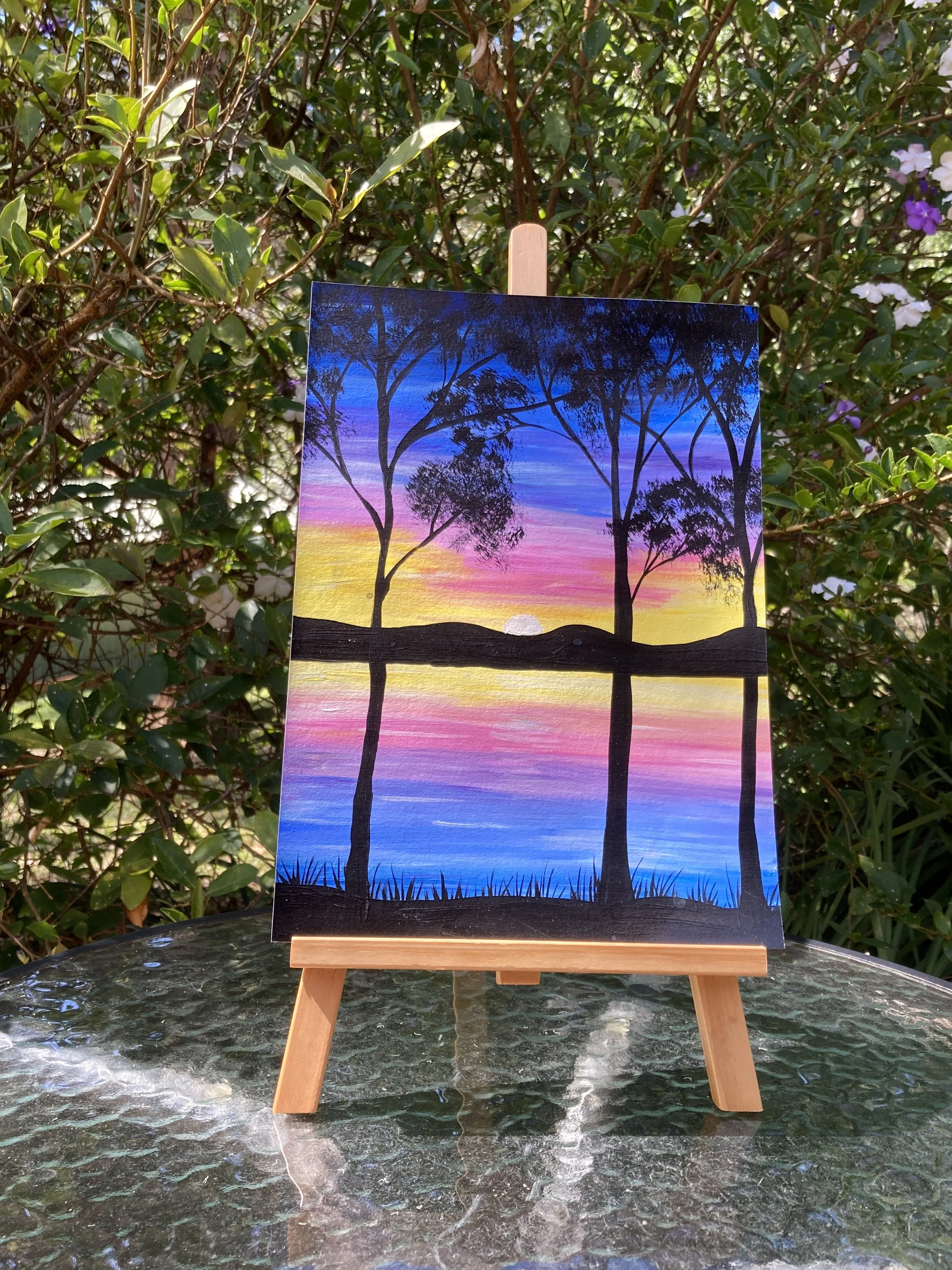 Lakeside Sunset on easel.JPG