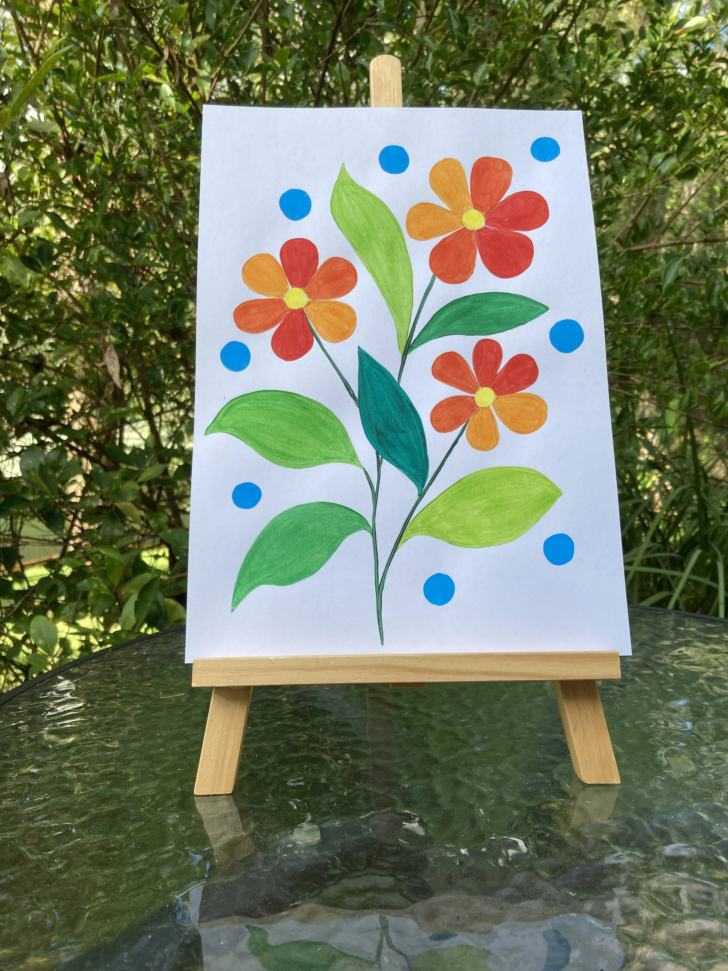 Flowers and Dots painting on easel.JPG