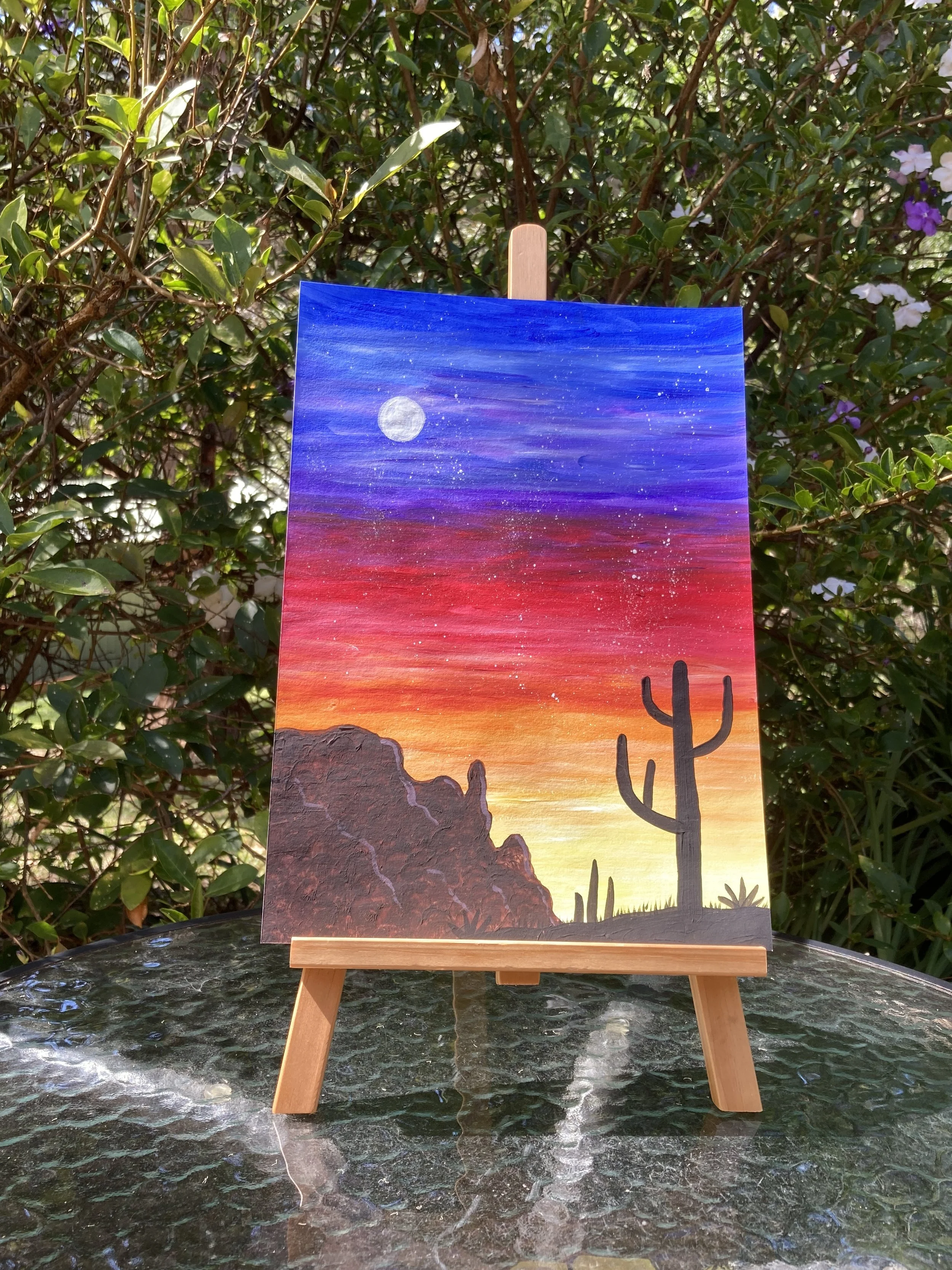 Desert Sunset on easel.JPG