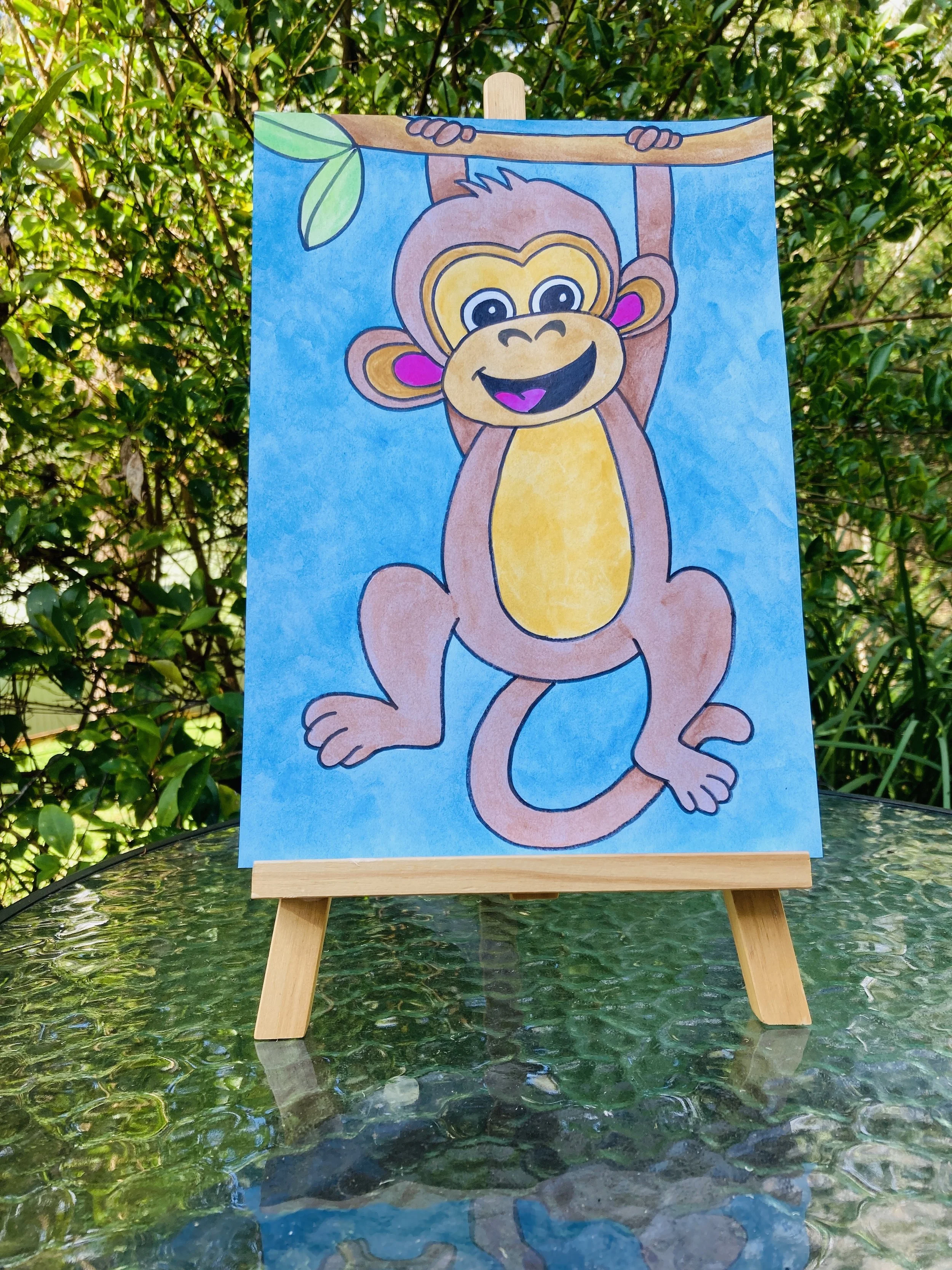 Cheeky Monkey painting on easel.jpg